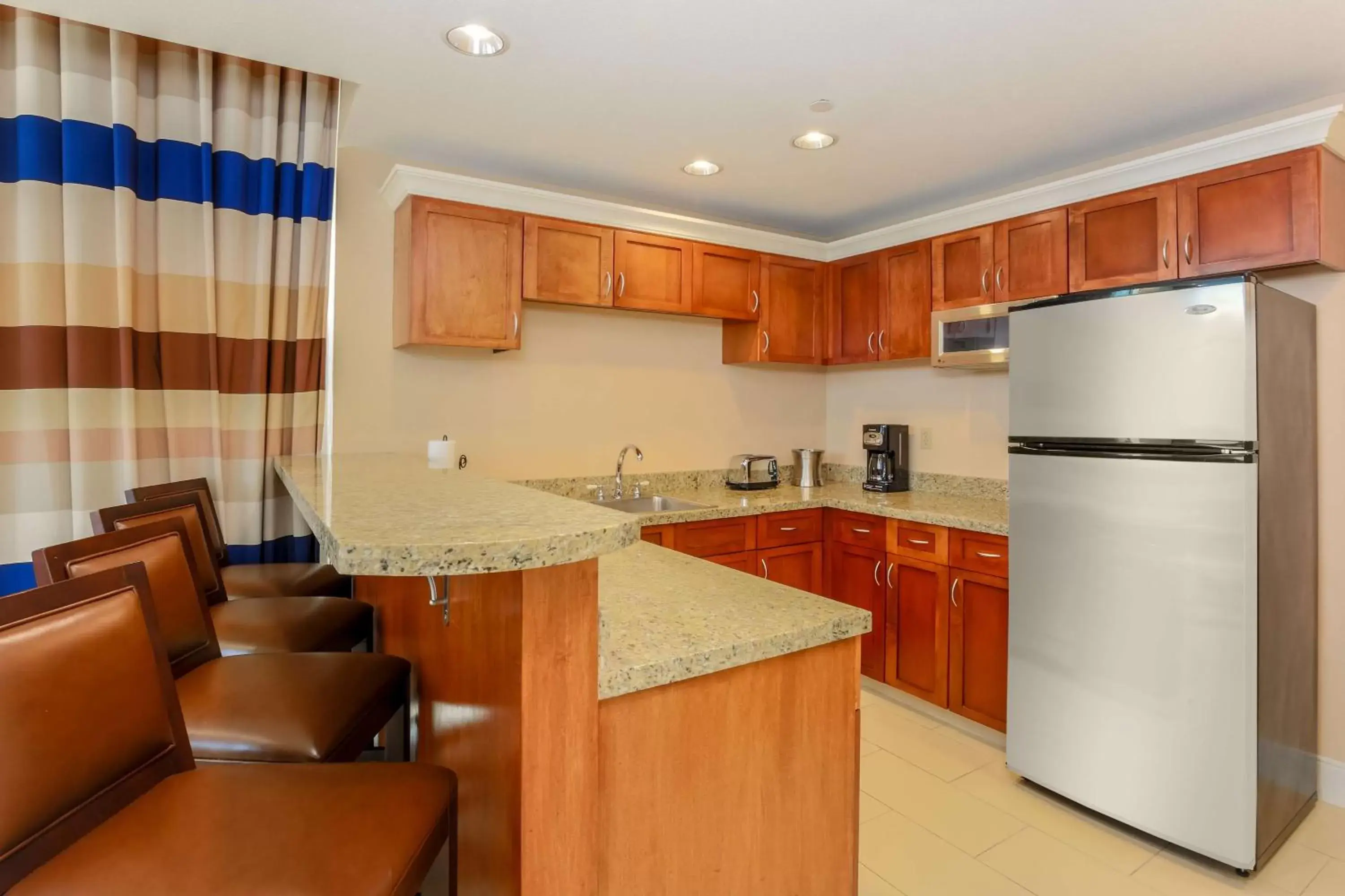 Bedroom, Kitchen/Kitchenette in Hilton Branson Convention Center