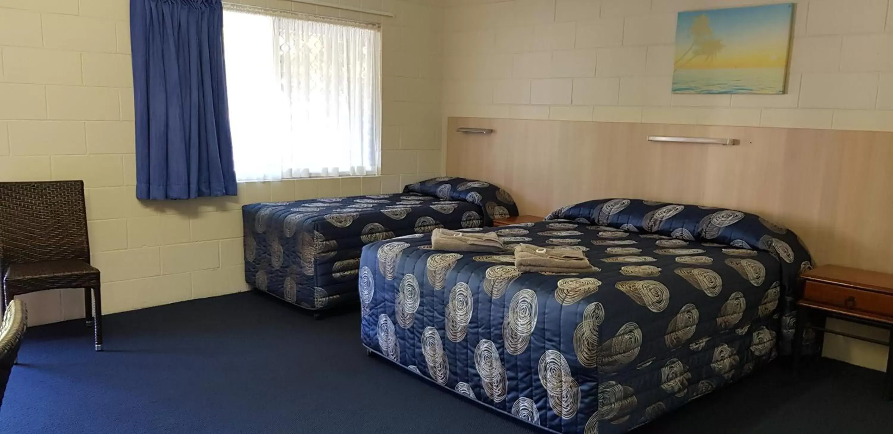 Bed in Mango Tree Motel Bed in Mango Tree Motel