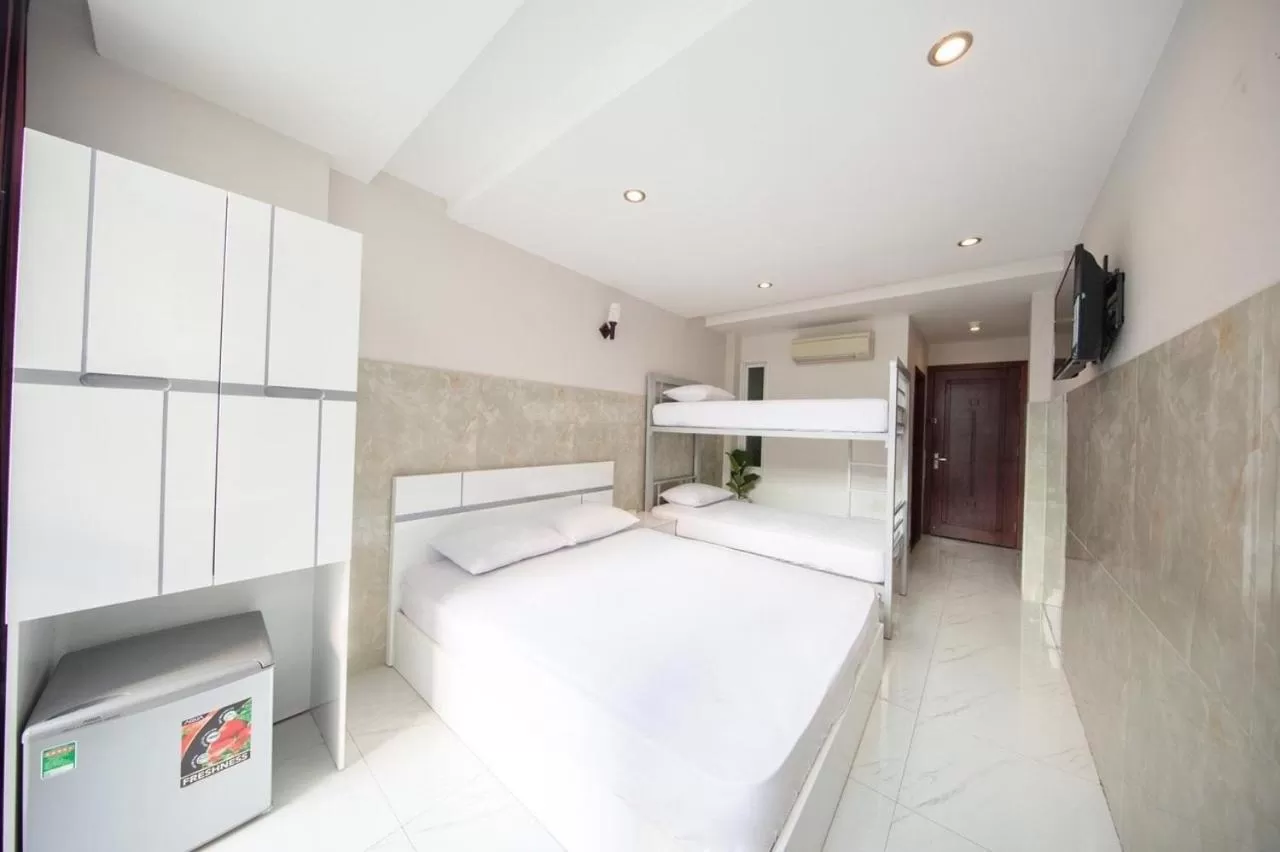 Bed in SaiGon CoZy Hotel "241 Pham Ngu Lao Street''