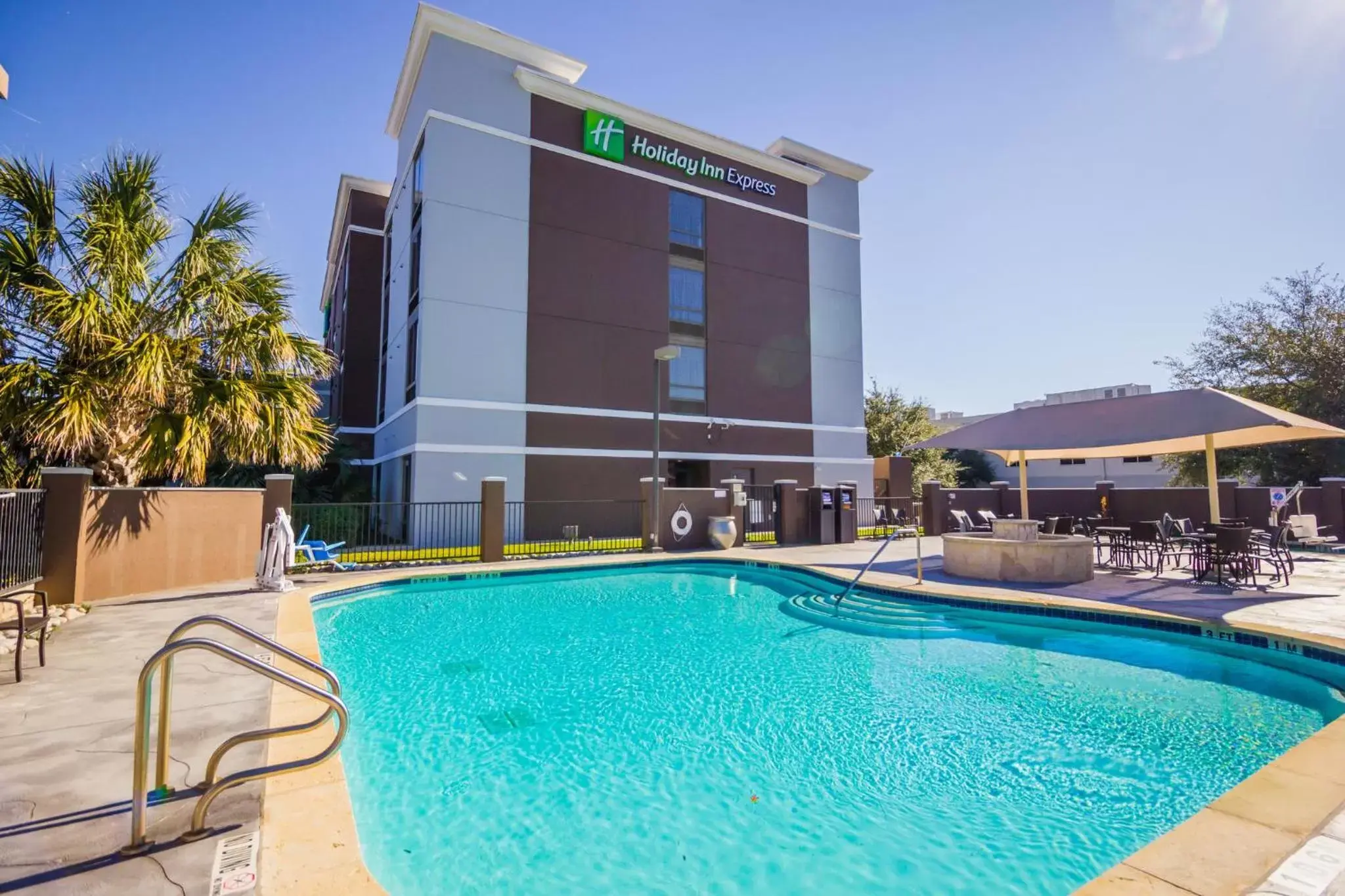 Swimming pool, Property Building in Holiday Inn Express Hotel & Suites Austin Airport, an IHG Hotel