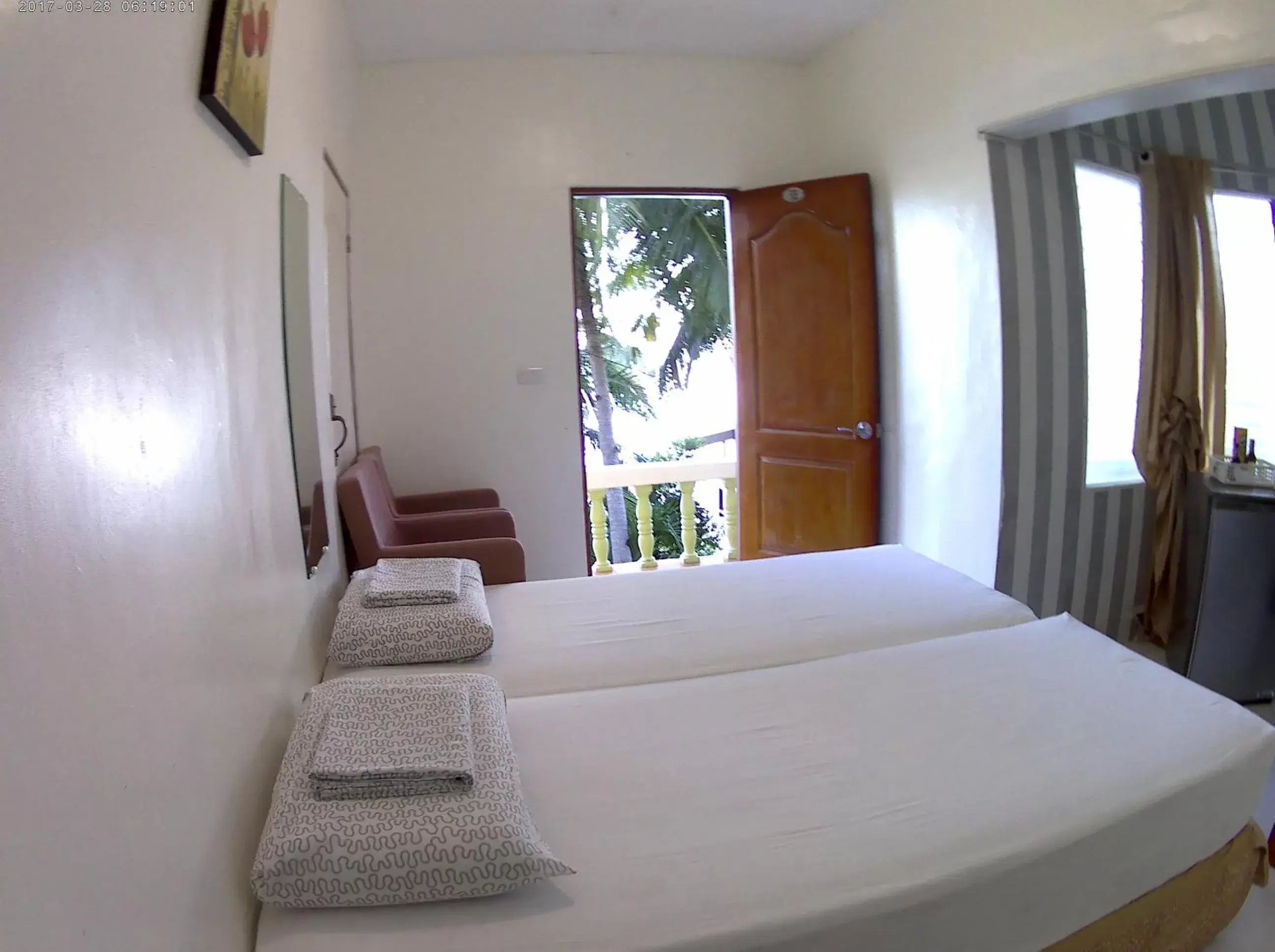 Bed in Oslob Seafari Resort