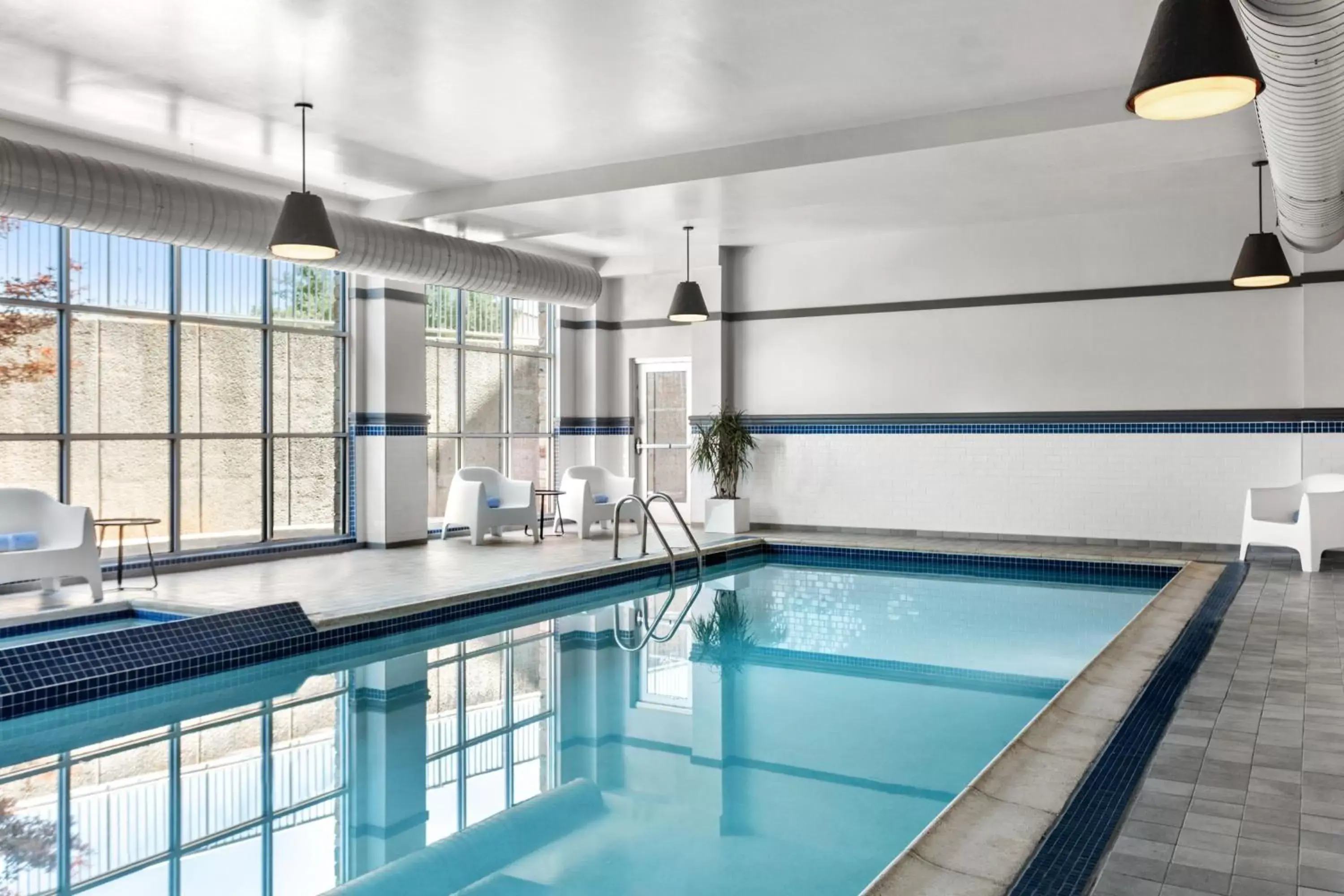 Swimming Pool in Delta Hotels by Marriott Midwest City at the Reed Conference Center