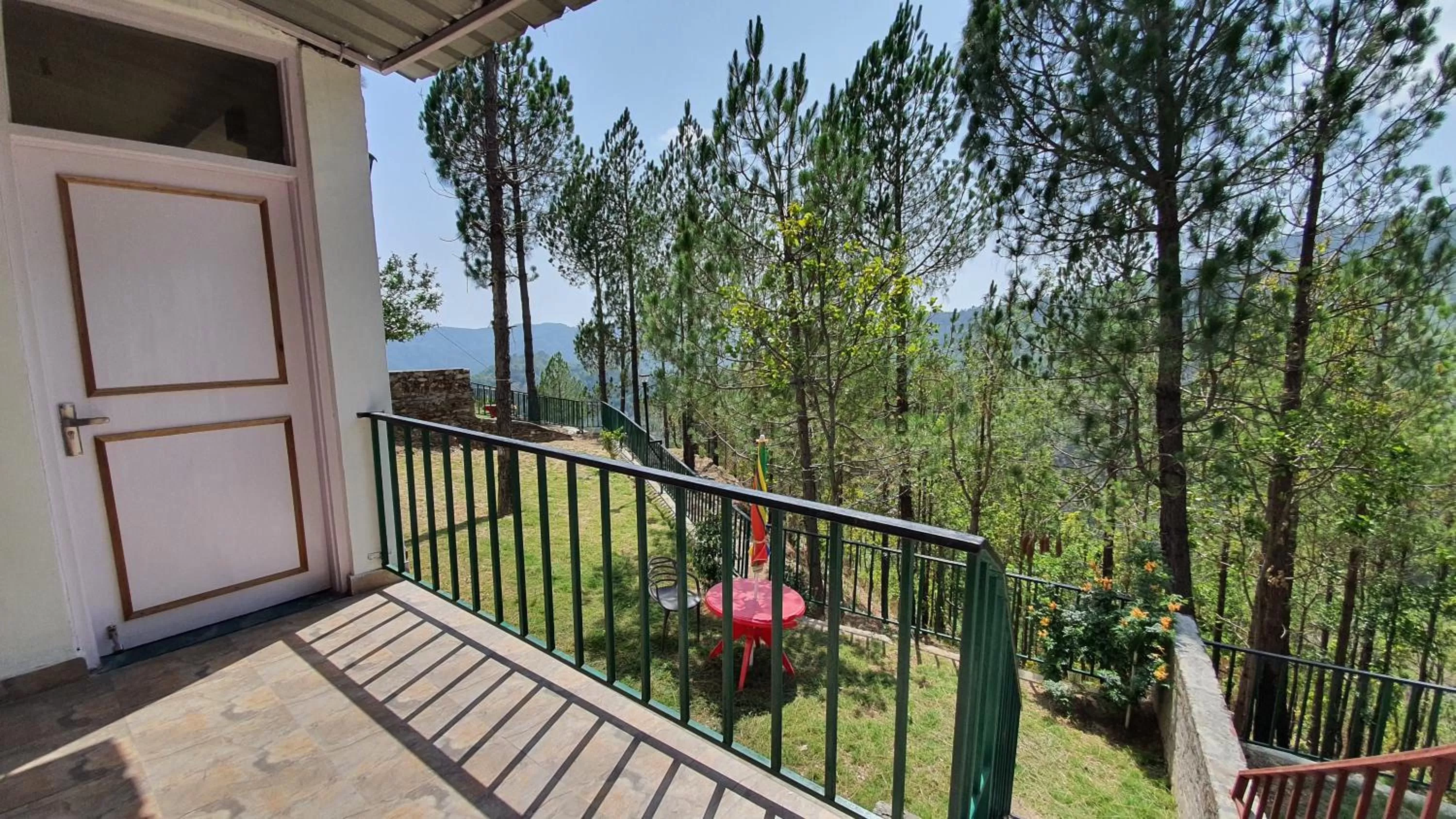 Garden view, Balcony/Terrace in Blue Pine Orchards - Villas