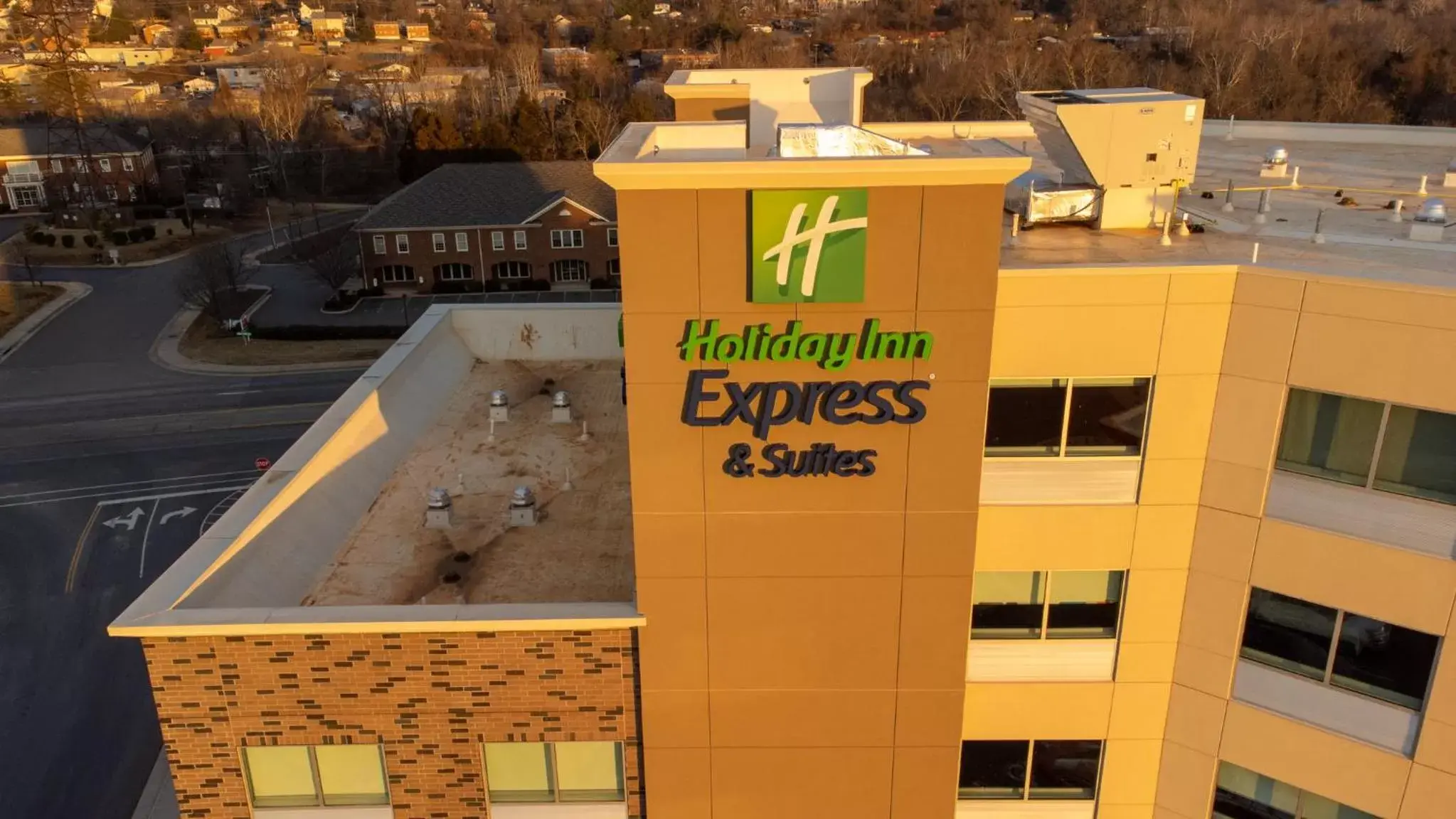 Property logo or sign in Holiday Inn Express & Suites Charlottesville, an IHG Hotel