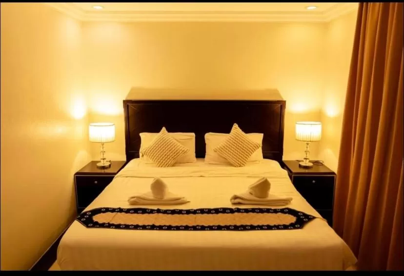 Bed in Ivory Palace Hotel