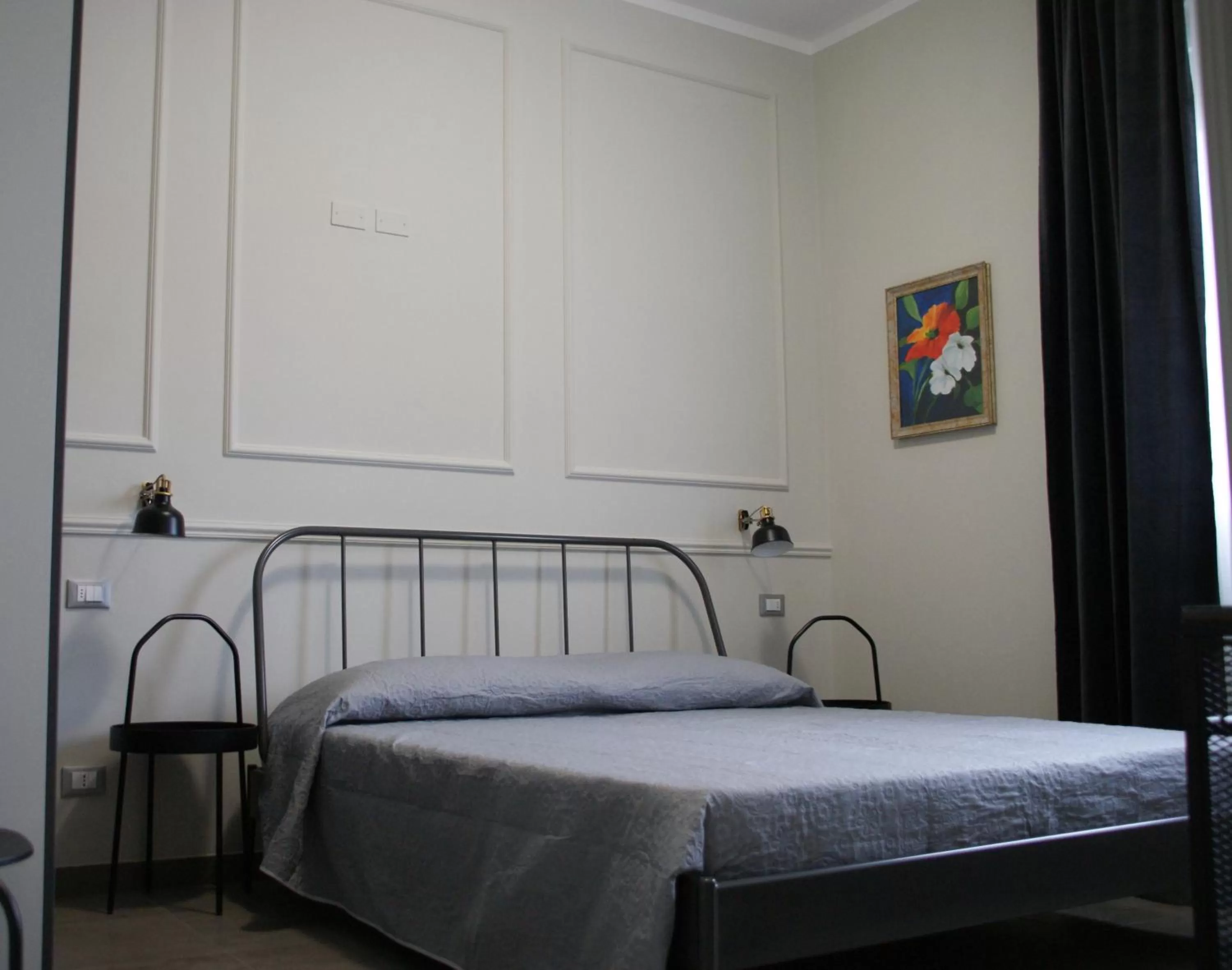 Bed in LA DAMA ROOM&BREAKFAST