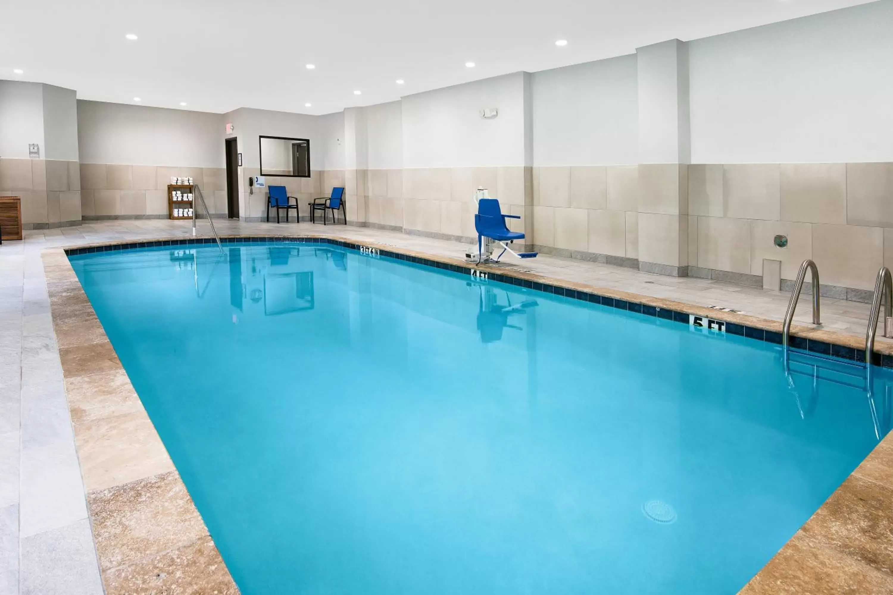 Swimming Pool in Holiday Inn Express and Suites Houston North - IAH Area, an IHG Hotel