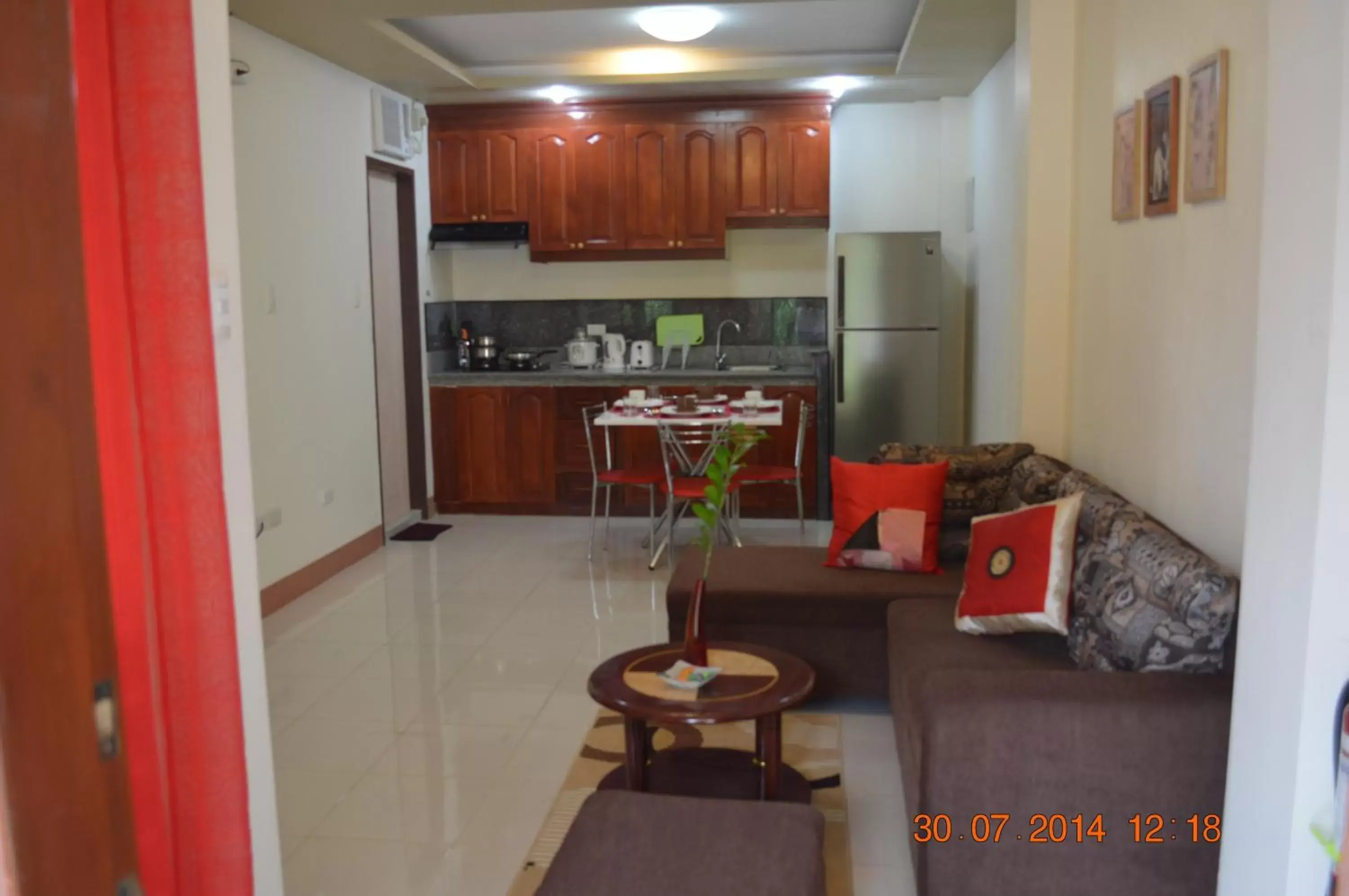 Living room, Kitchen/Kitchenette in Manora Apartment