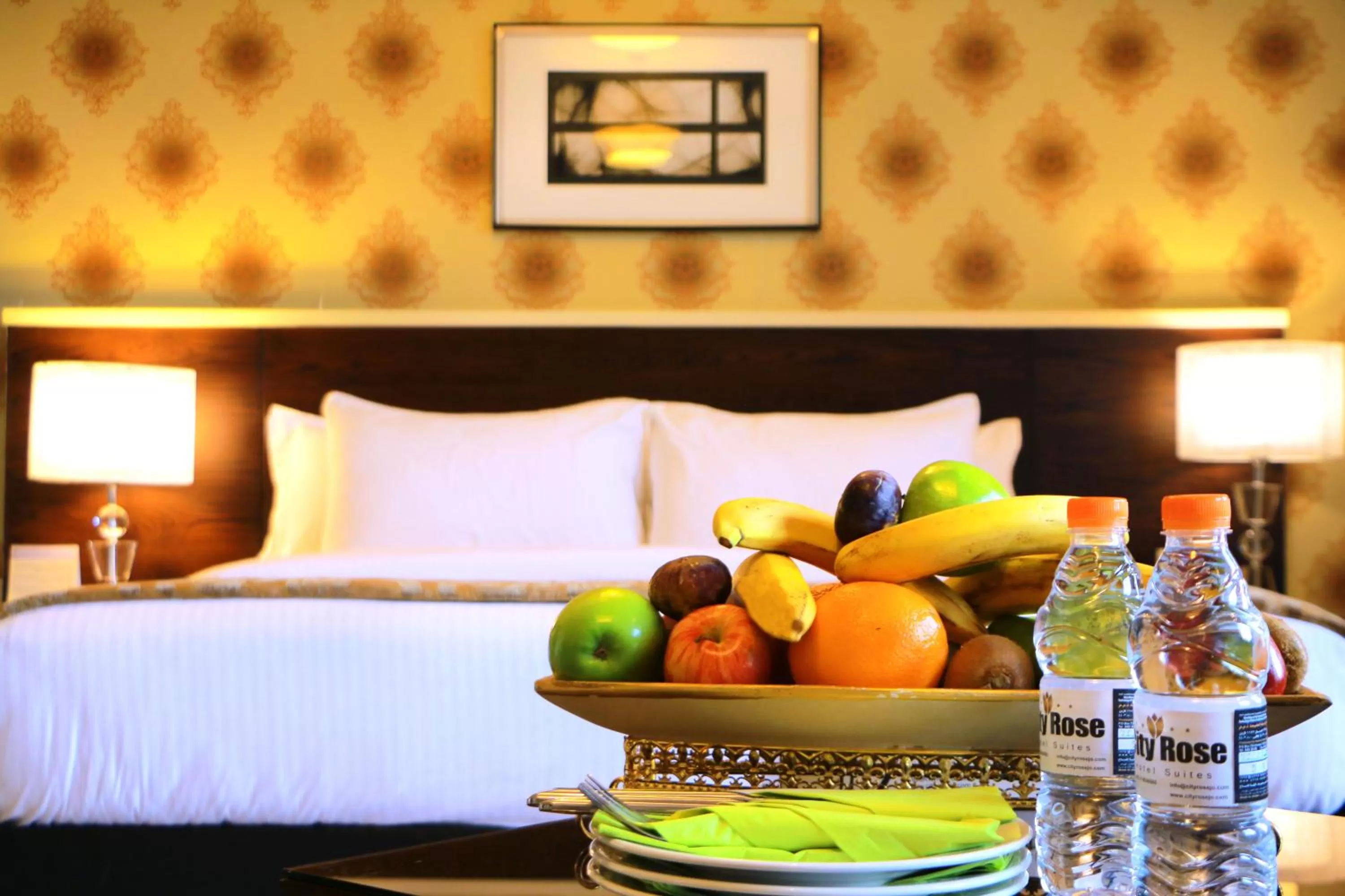 Bed in City Rose Hotel Suites