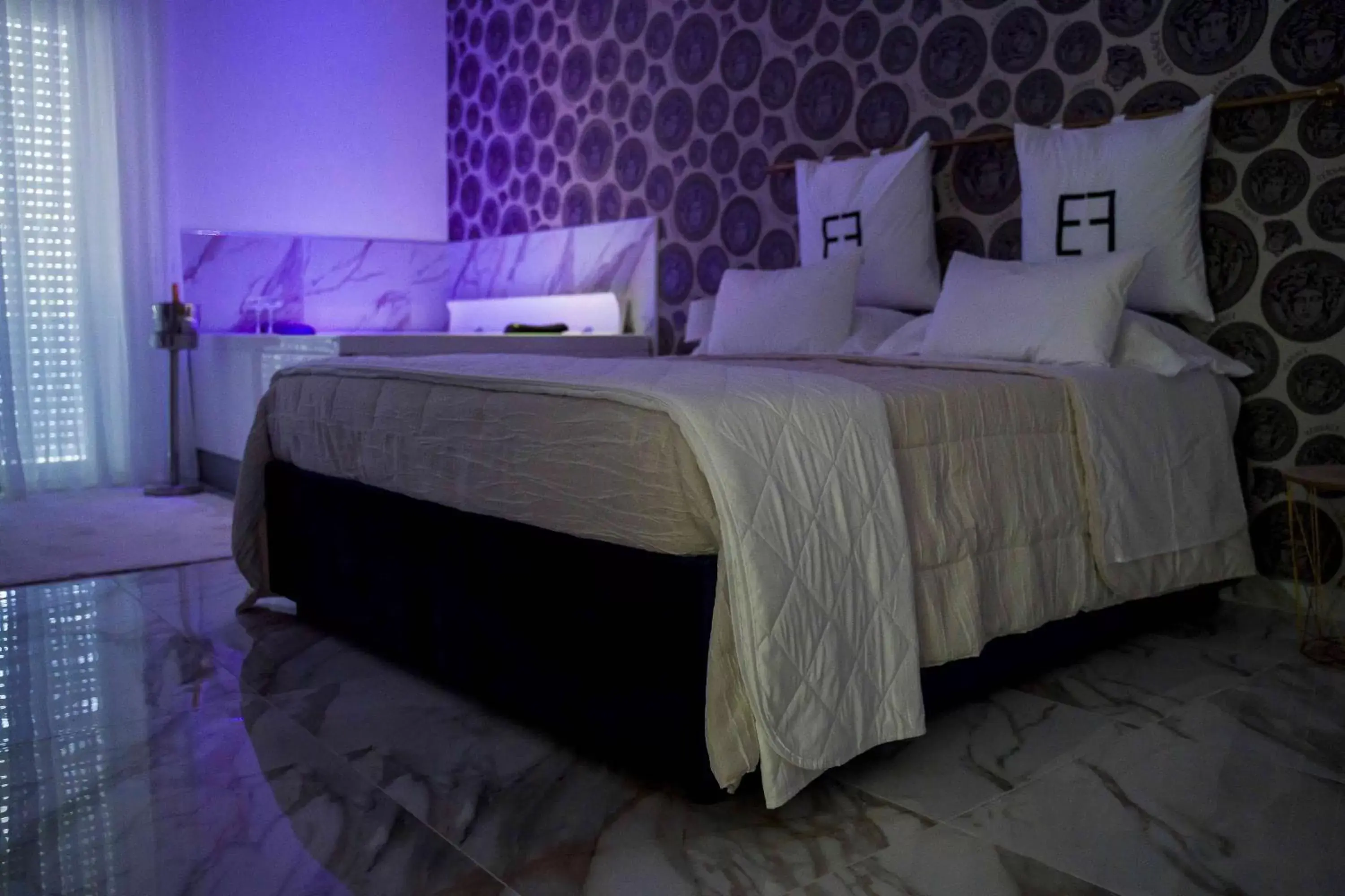 Bed in EF LUXURY LIVING RESORT AND SPA