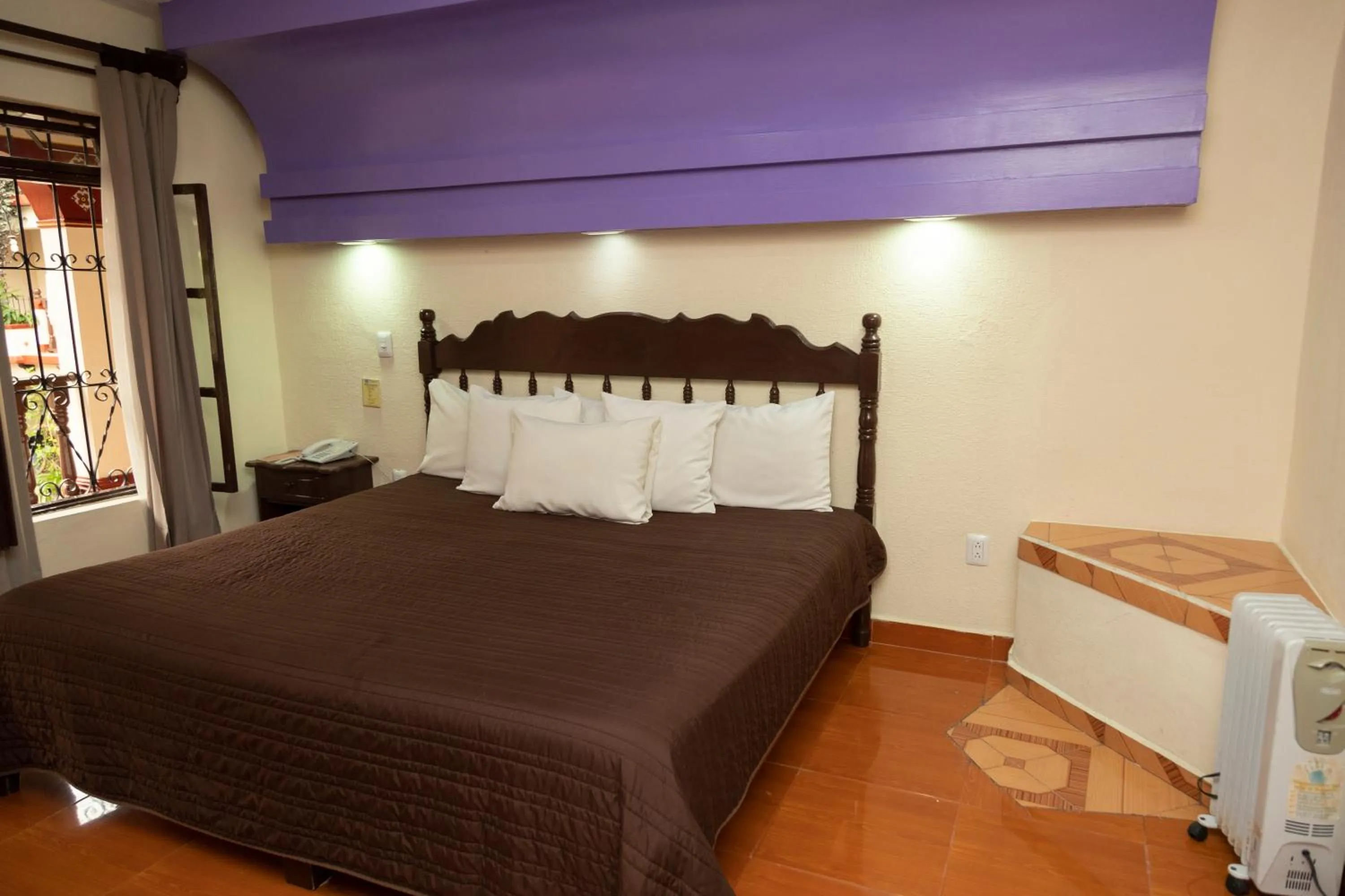 Bed in Hotel D’Monica