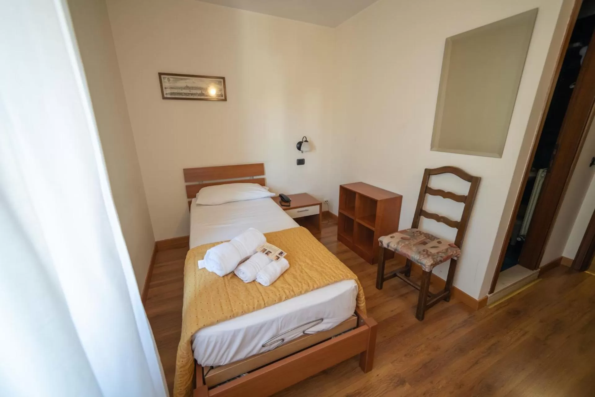 Bed in Hotel Siros