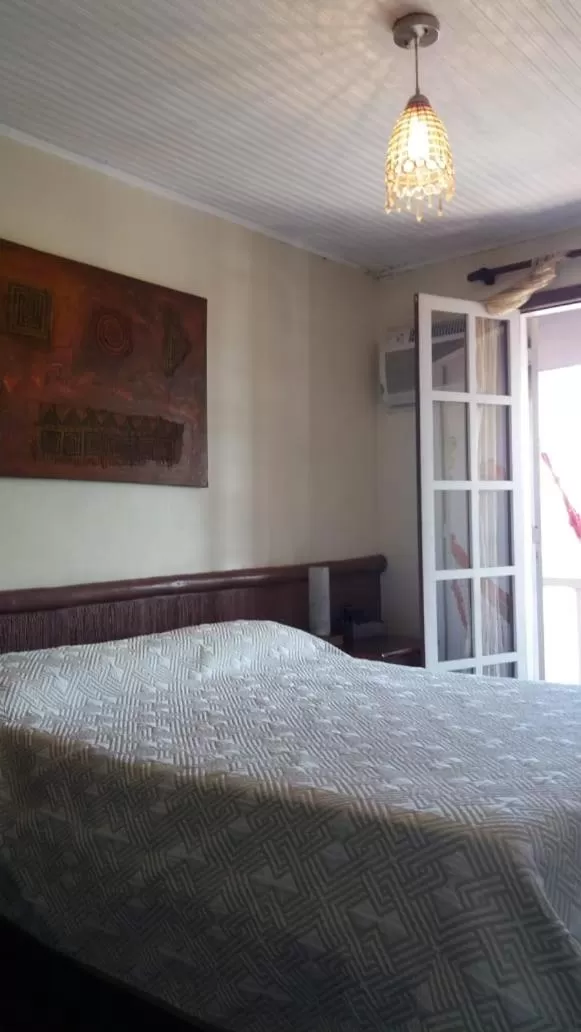 Bed in Pousada L'escale