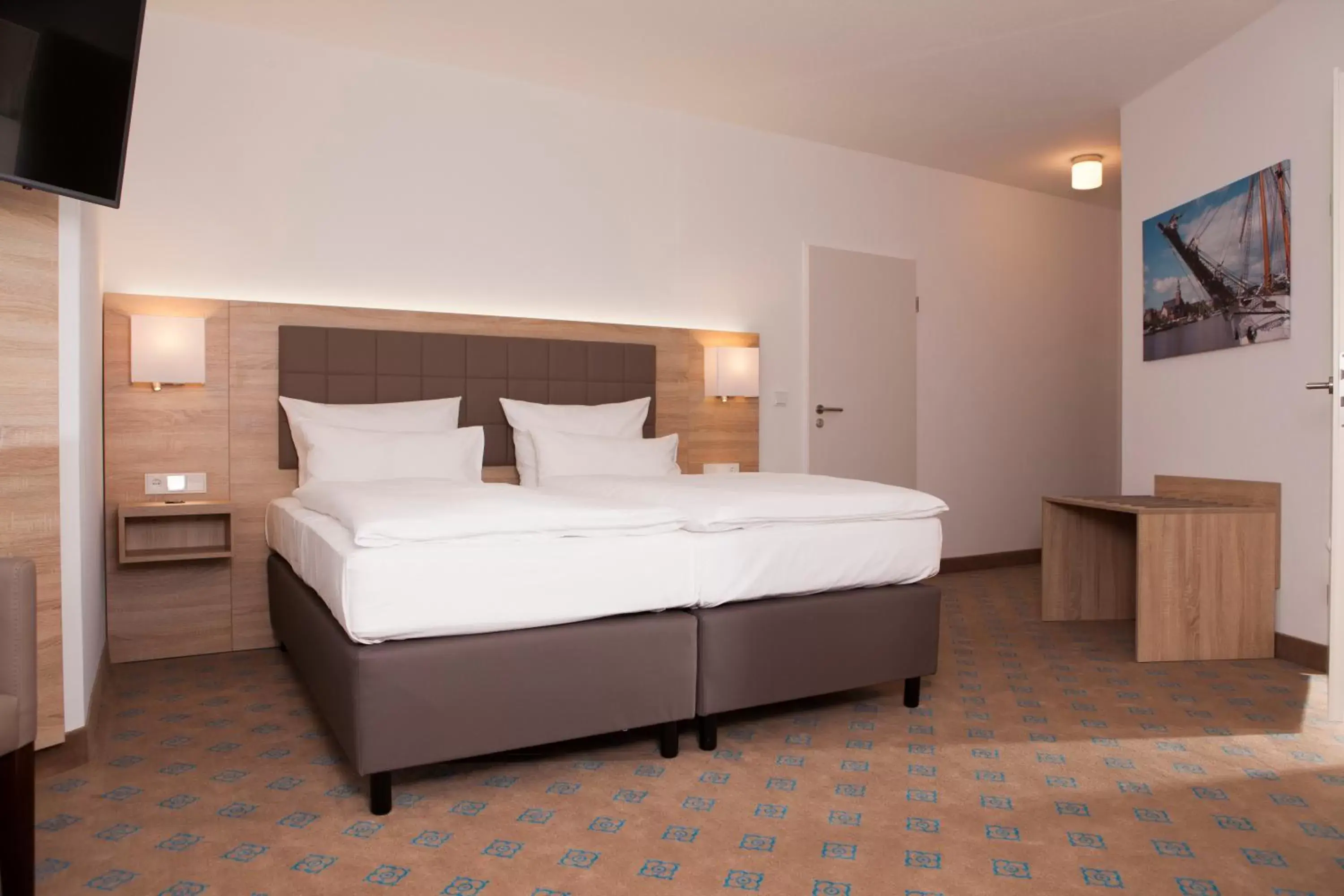 Bed in Hotel Frisia
