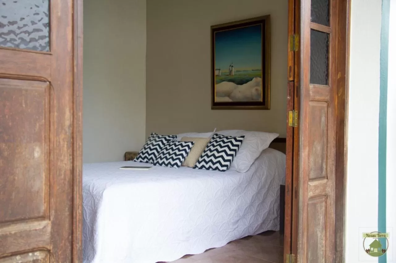 Bed in Pousada Nossa Terra