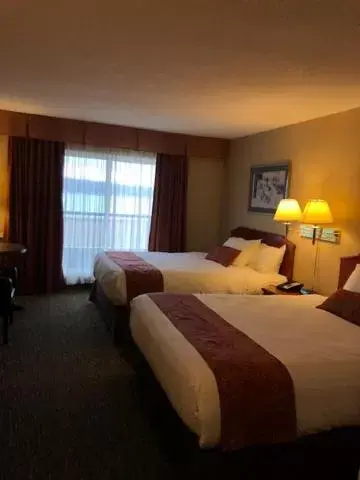 Bed in Anchor Inn and Suites