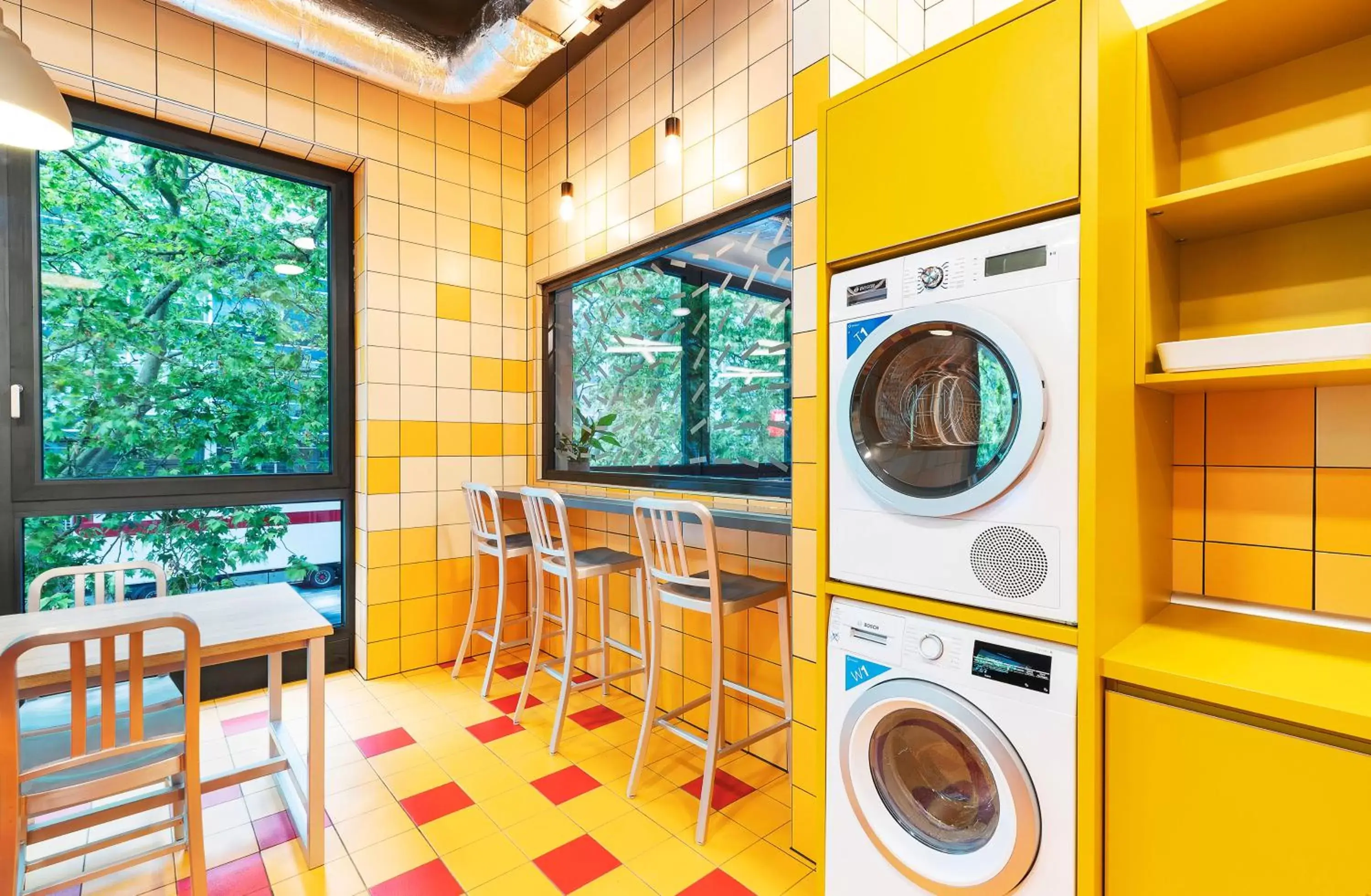 Communal kitchen in MEININGER Hotel Genève Centre Charmilles