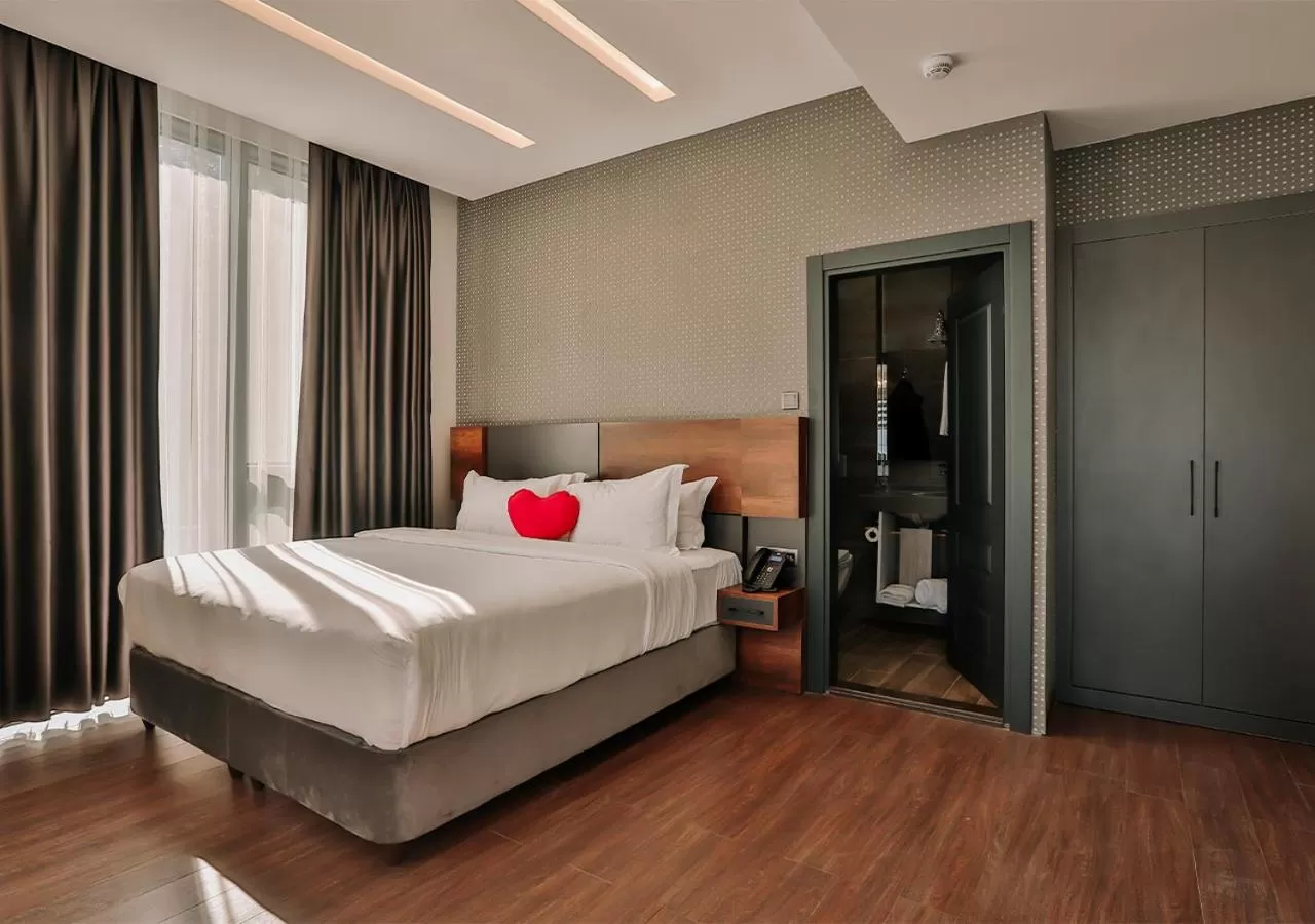 Bed in Peerless Villas Hotel