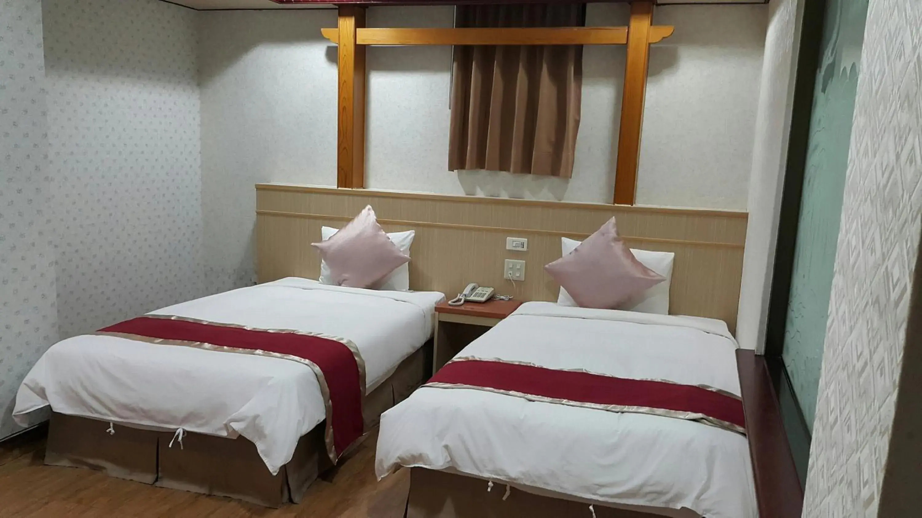 Bed in Mei-Hua Hotel