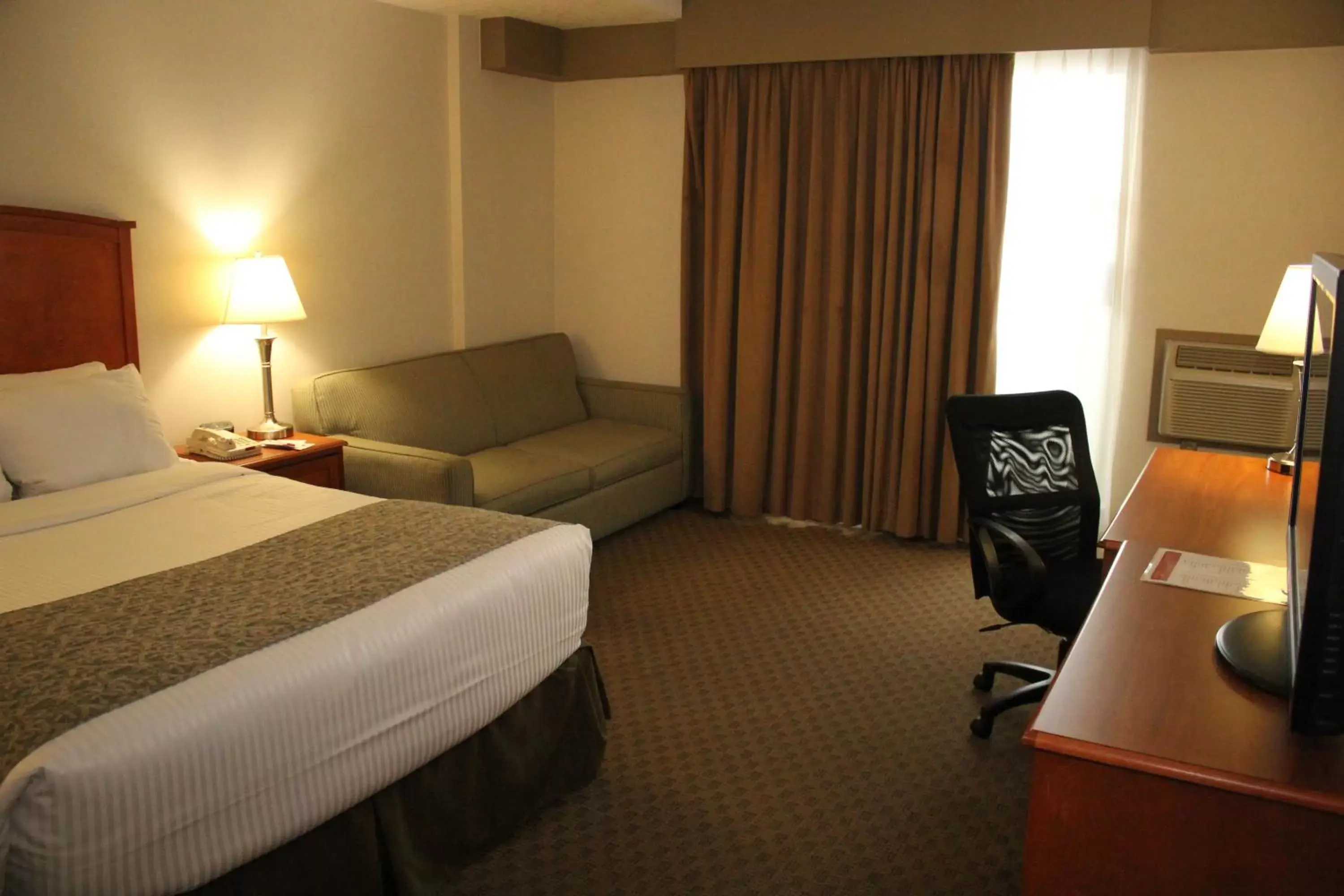 Photo of the whole room, Bed in Ramada by Wyndham Edmonton South