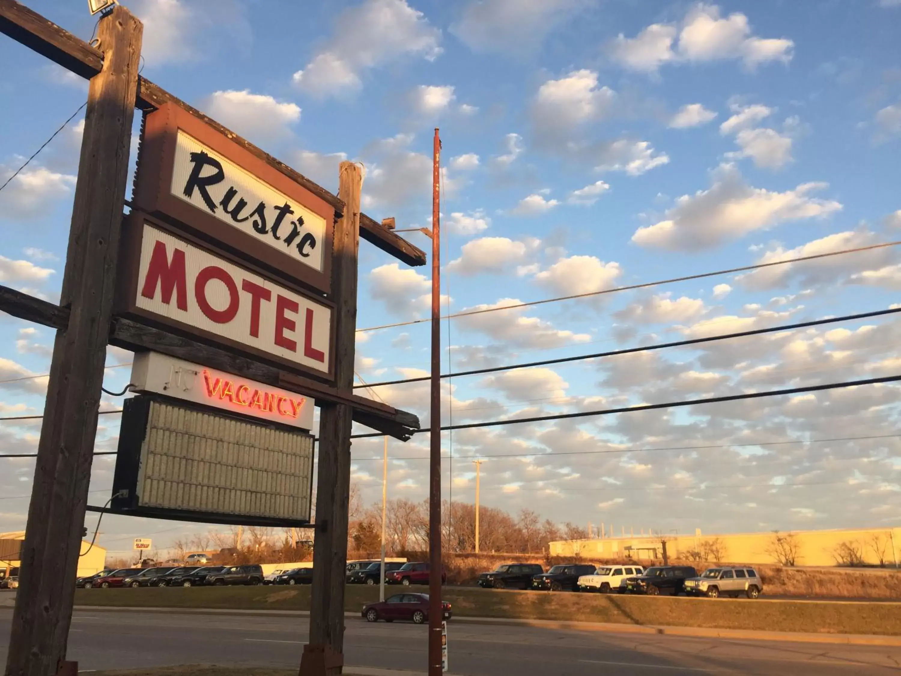 Property Logo/Sign in Rustic Motel Rolla