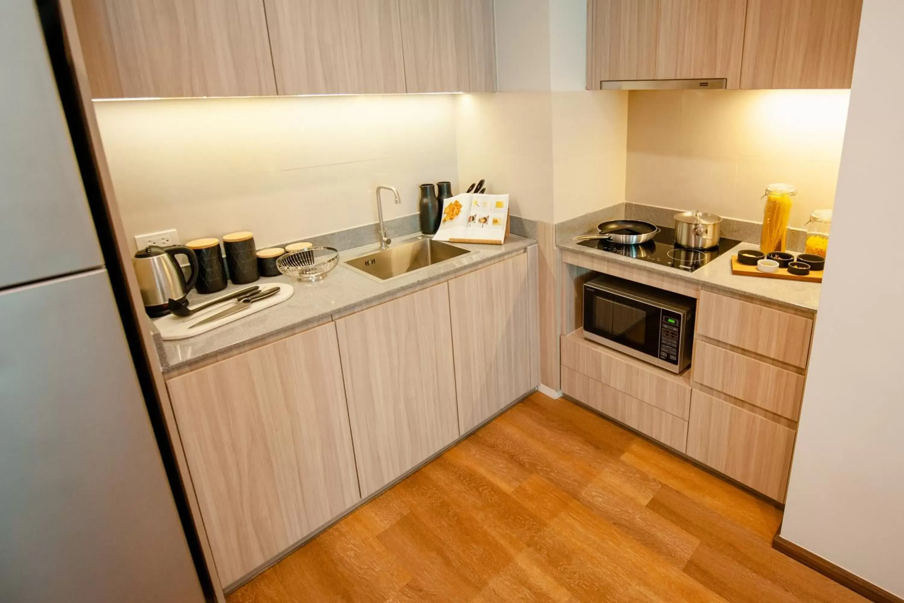 Kitchen or kitchenette, Kitchen/Kitchenette in Oakwood Hotel & Residence Sriracha - SHA Extra Plus