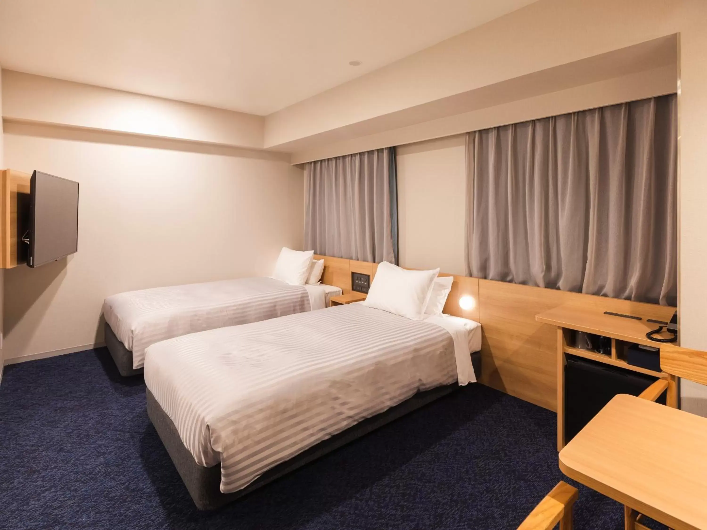 Photo of the whole room, Bed in Sotetsu Fresa Inn Nagoya-Shinkansenguchi