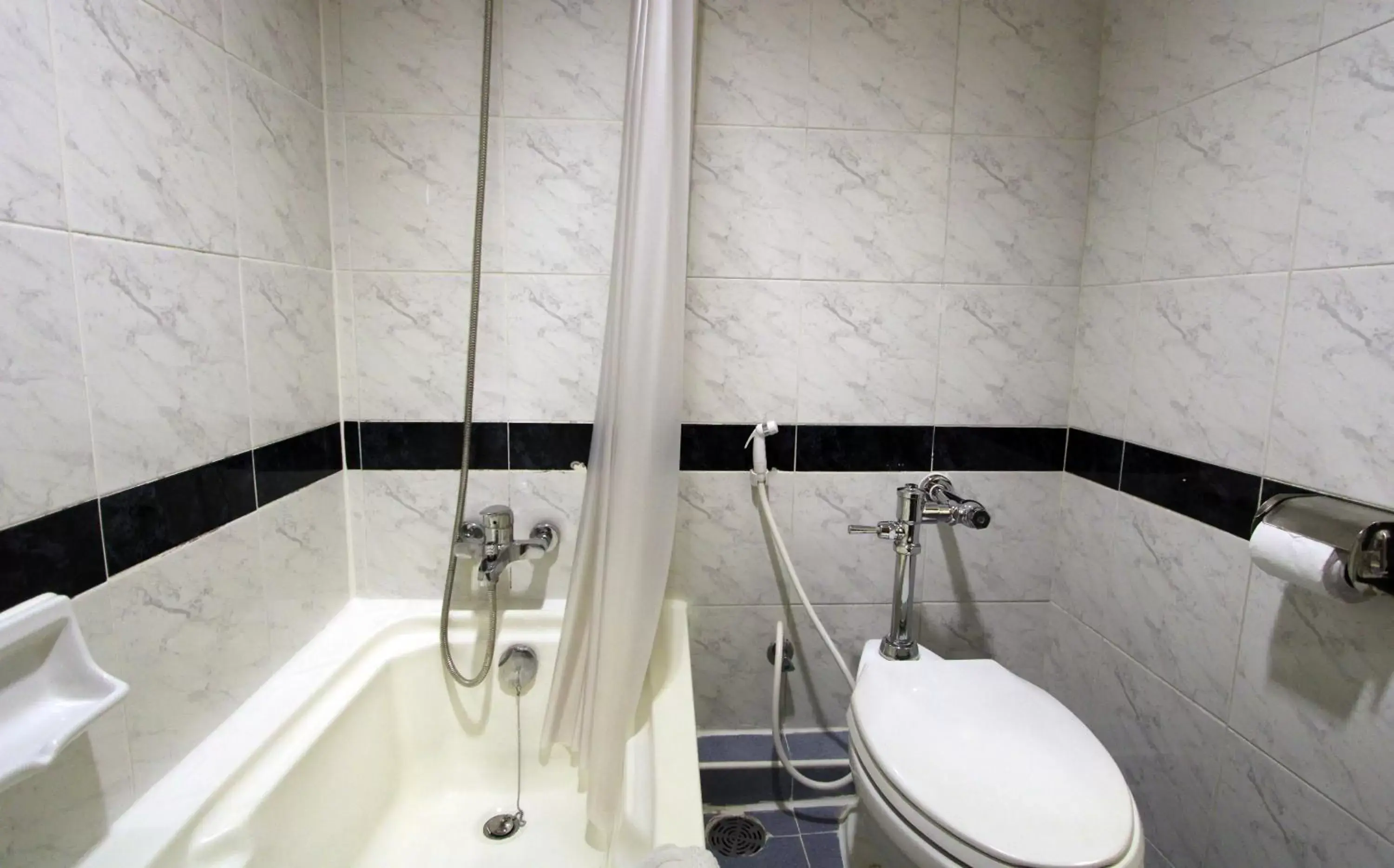 Bathroom in Grand Tower Inn Rama 6 - SHA Extra Plus