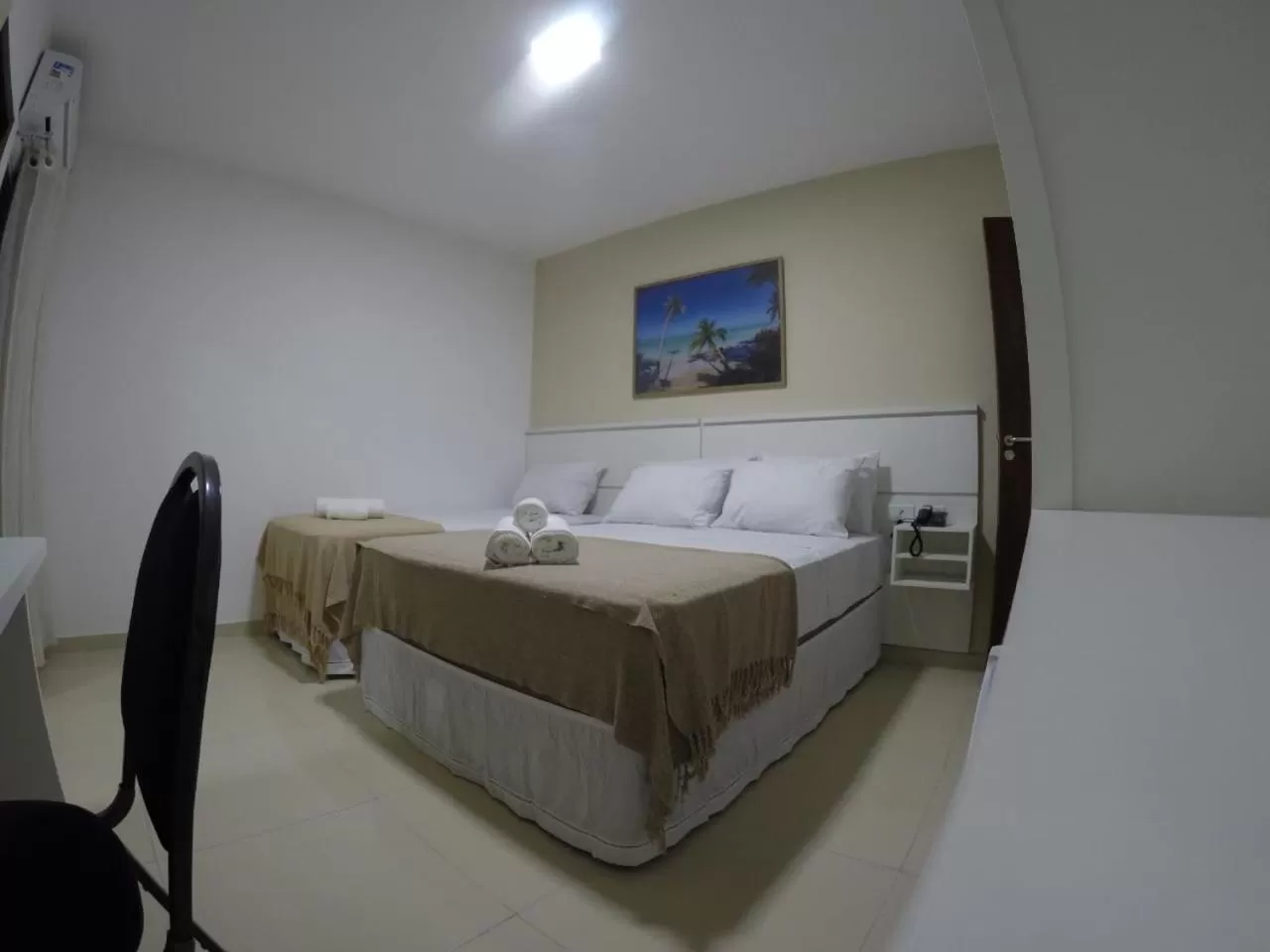 Bed in Pousada Kanoas