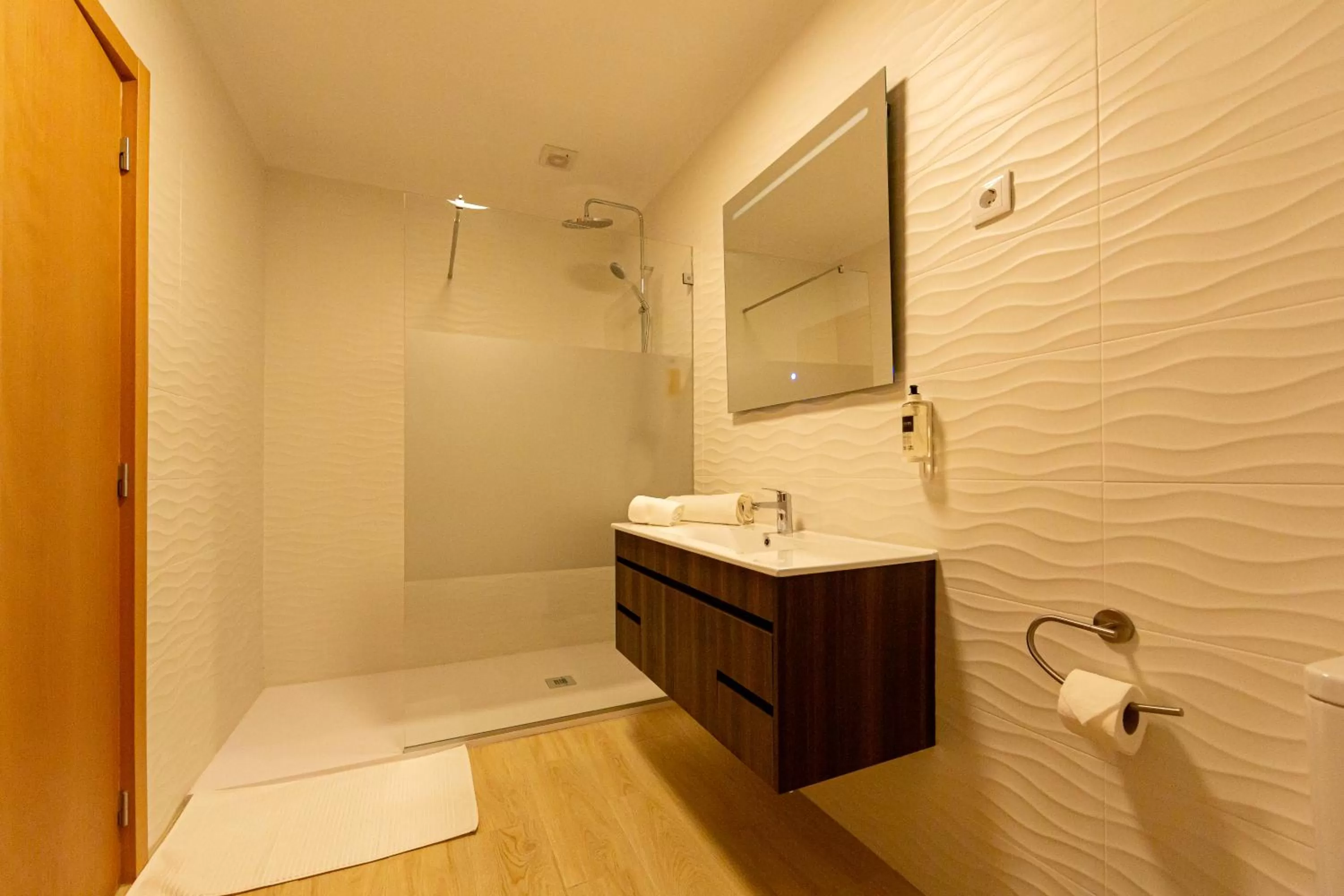 Shower, Bathroom in Luxury Palm Suites