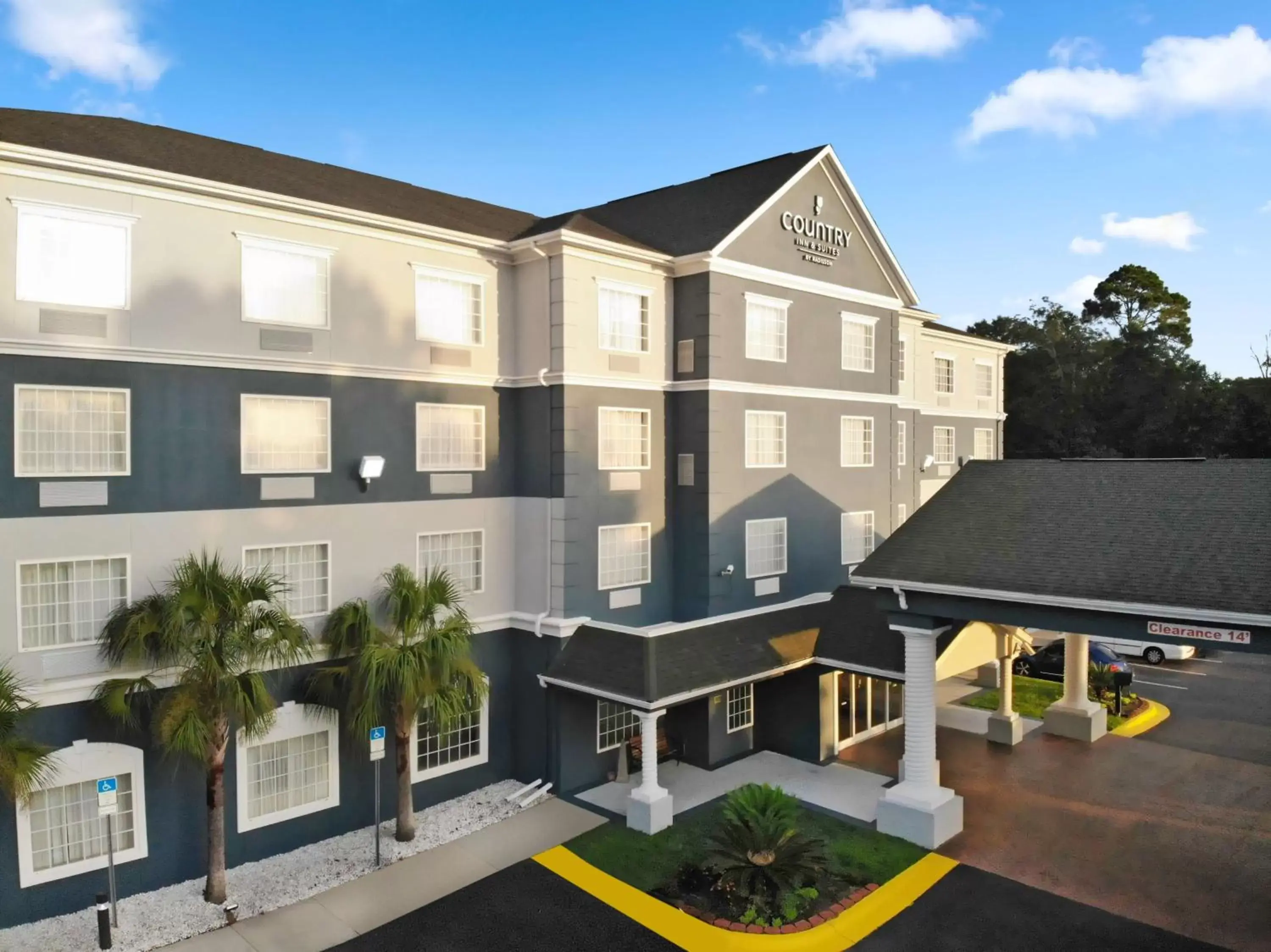 Property building in Country Inn & Suites by Radisson, Pensacola West, FL
