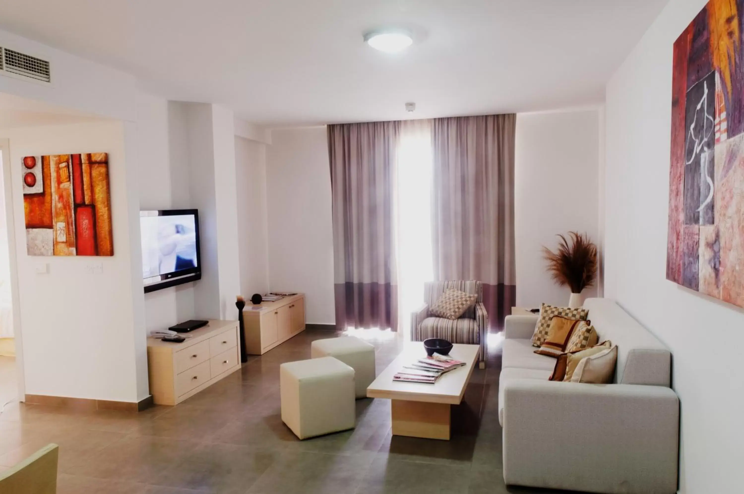 Living room, Seating Area in Capital Coast Resort And Spa