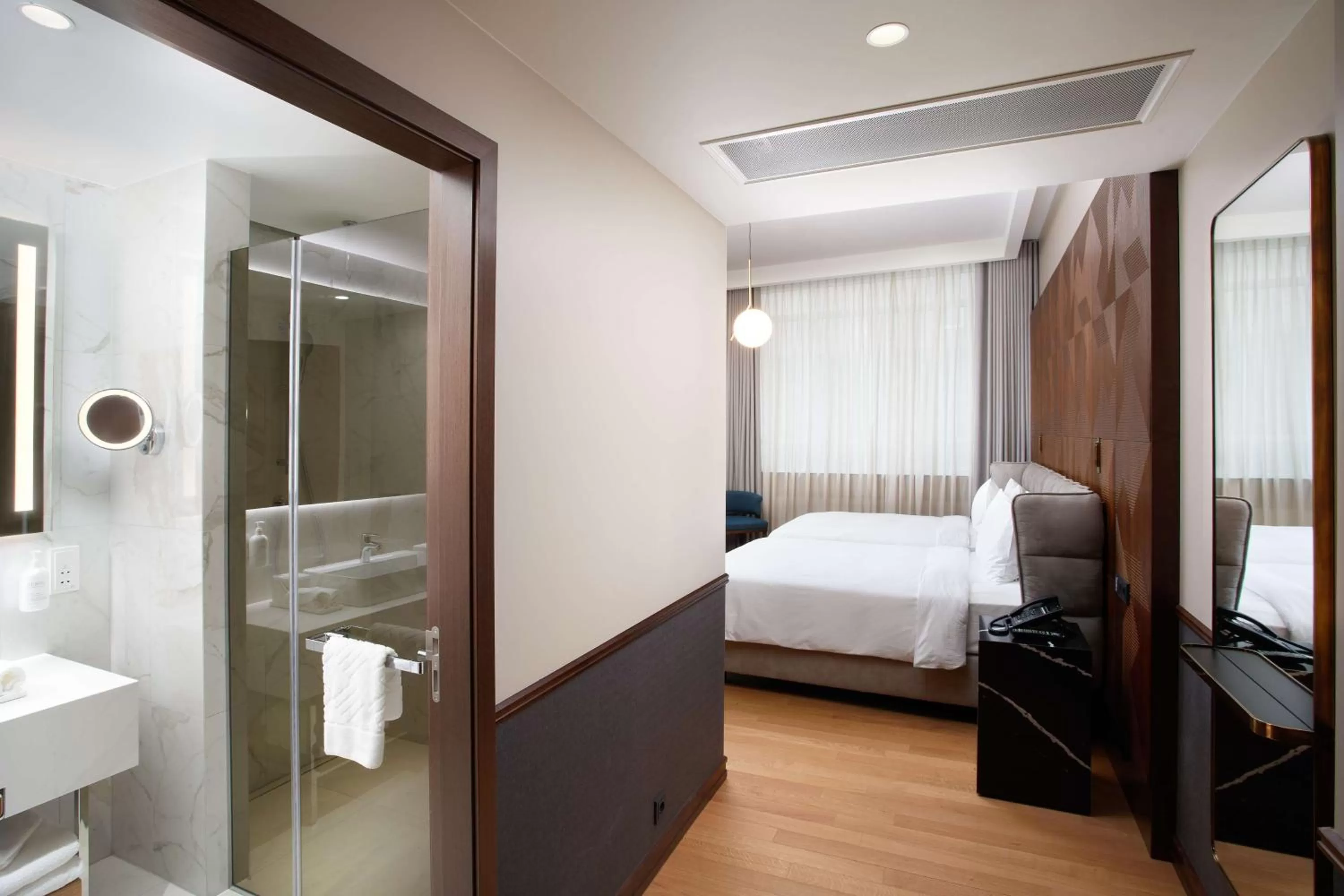 Bathroom, Bed in Iceland Parliament Hotel, Curio Collection By Hilton