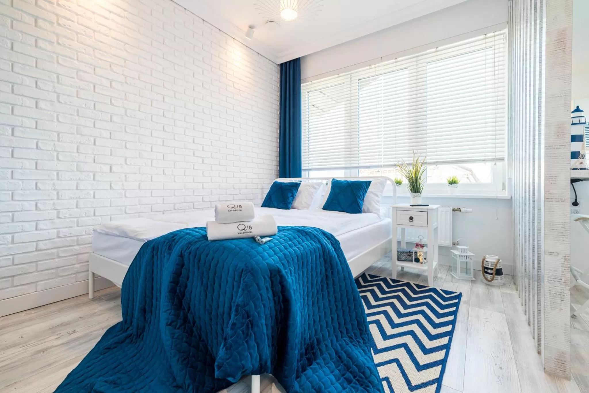 Bed in Q18 ApartHotel