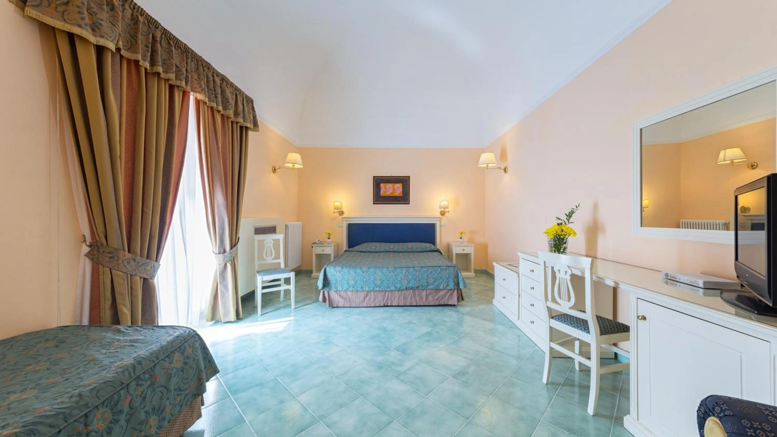 Bed in Hotel Iaccarino