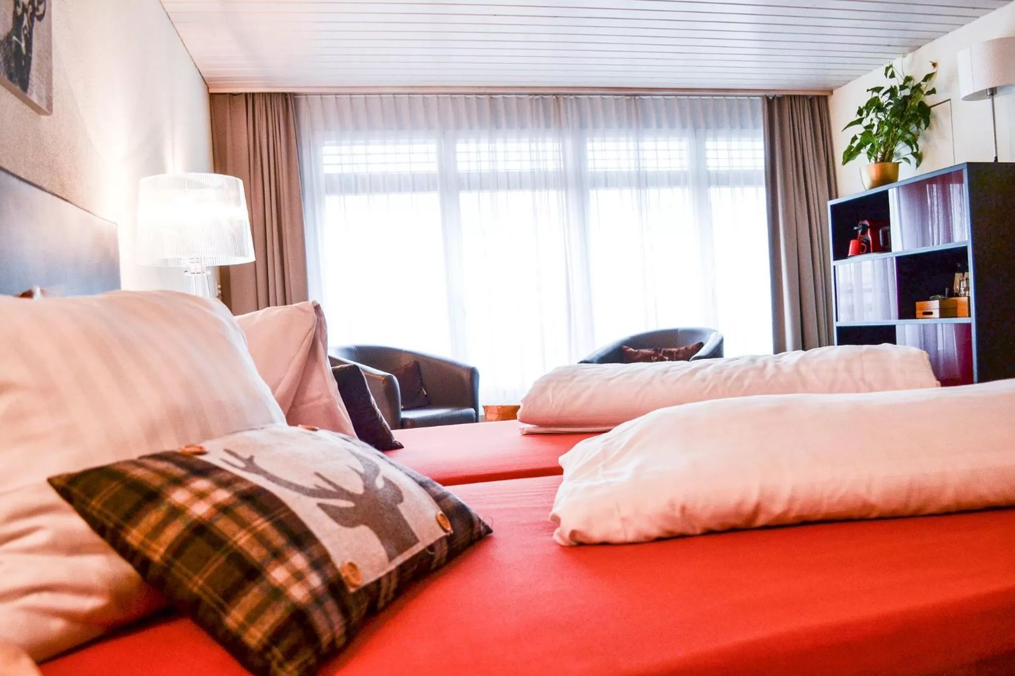 Photo of the whole room, Bed in Hotel Landhaus Säntis Herisau