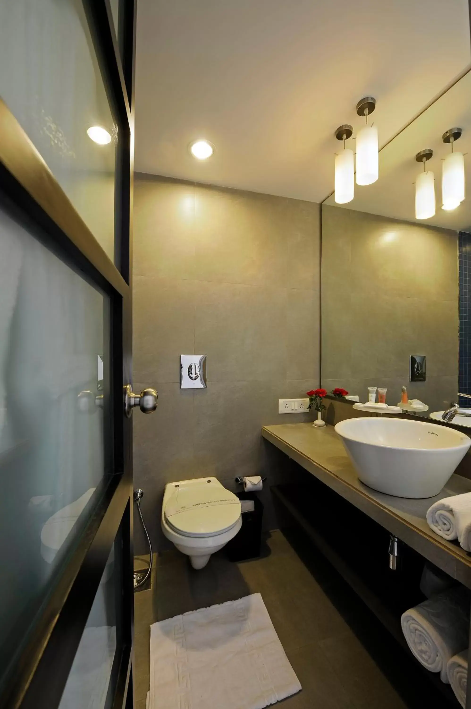 Bathroom in Whispering Palms Beach Resort