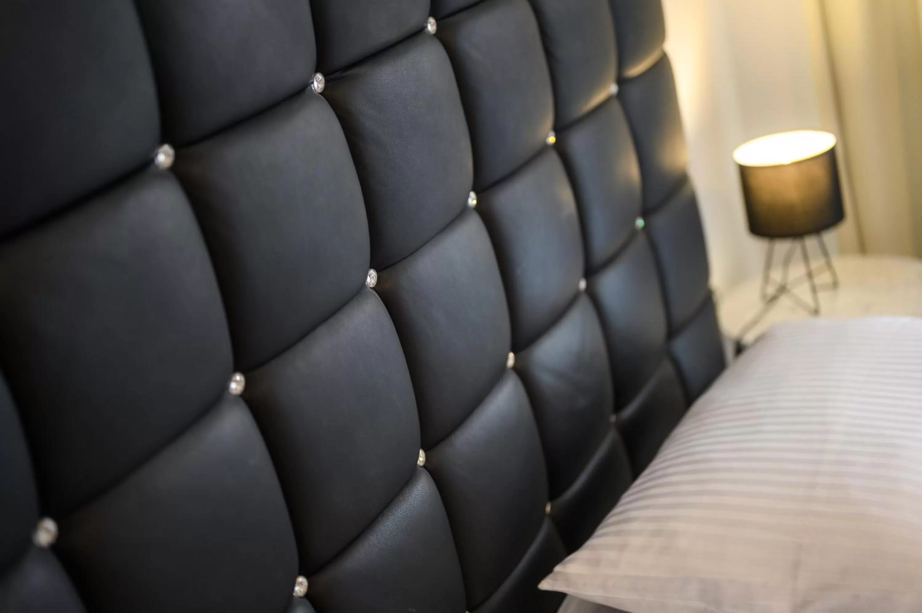 Bed in Boutique rooms Kican