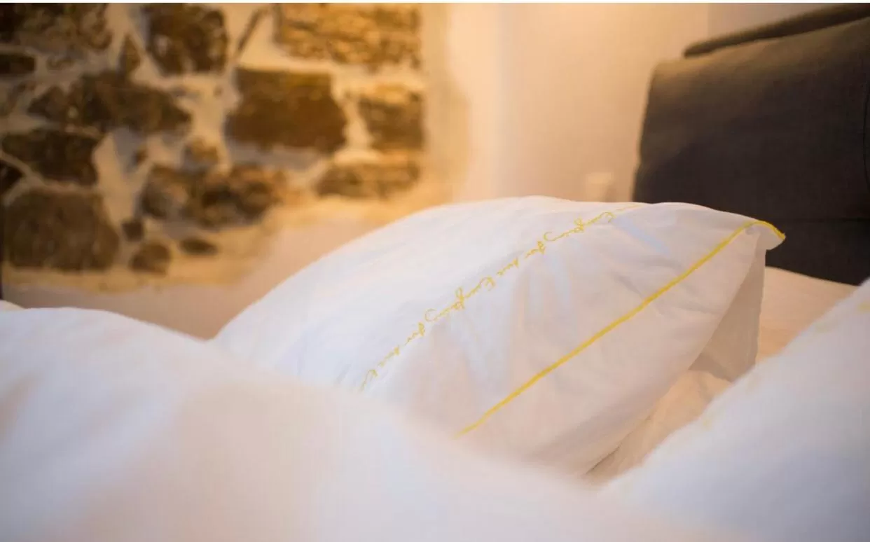 Bed in A litte Taste of Home Guest House