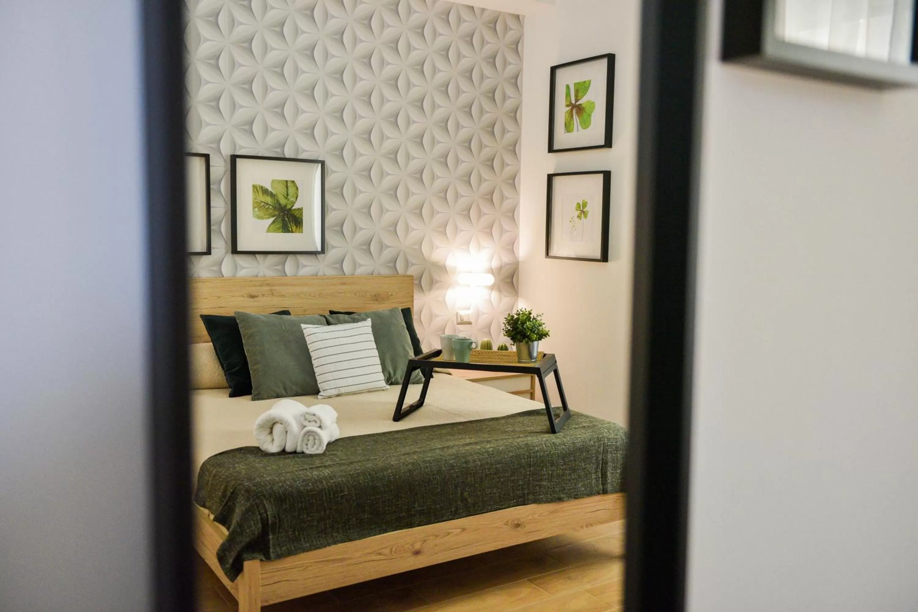 Decorative detail, Bed in B&B Portafortuna Lucky charm