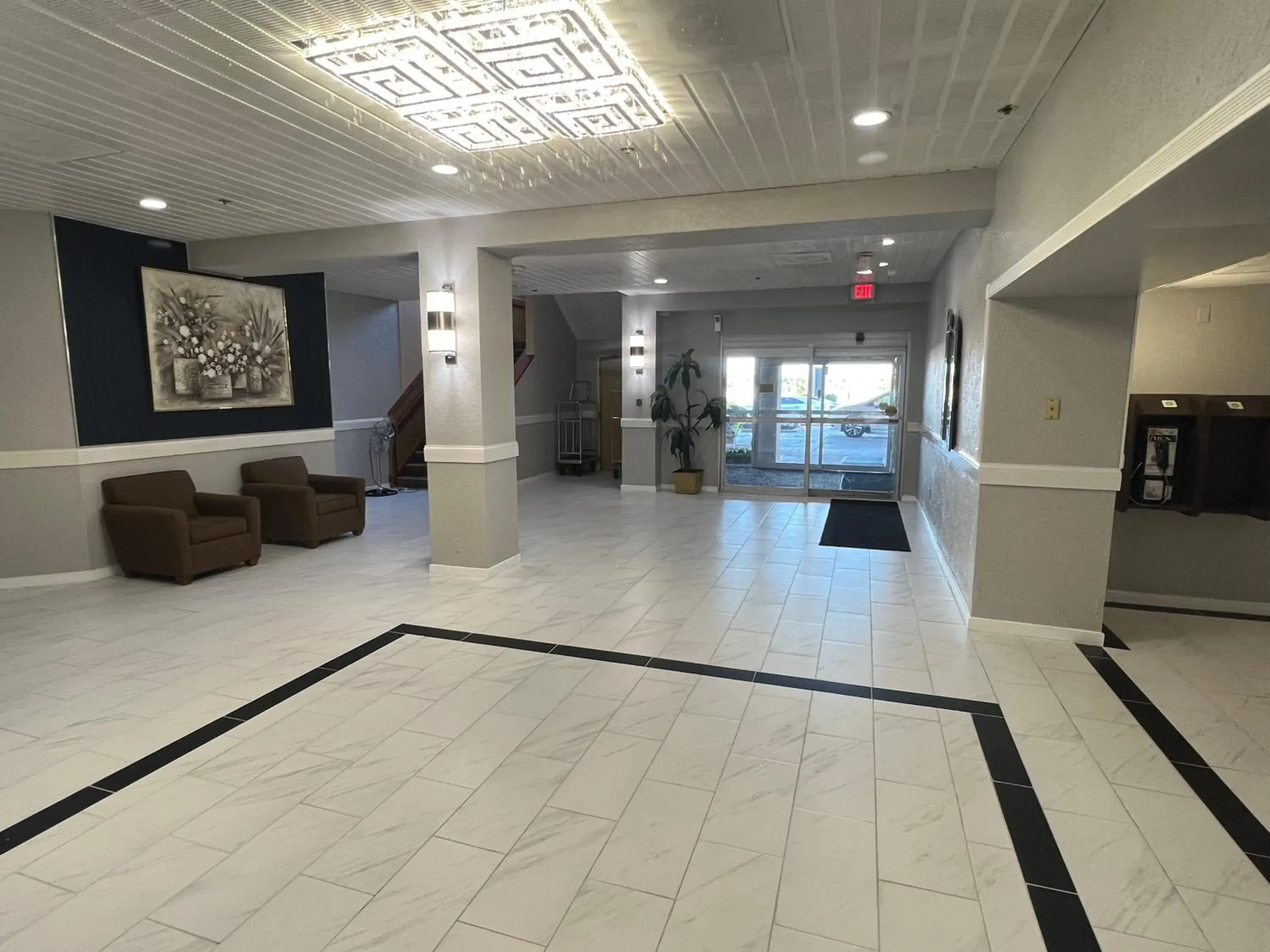 Lobby or reception in The Lodge Hotel and Banquets Lobby or reception in The Lodge Hotel and Banquets