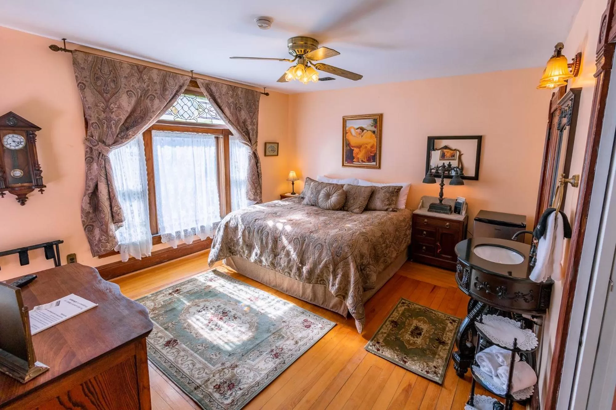 Bed, Seating Area in 1899 Inn