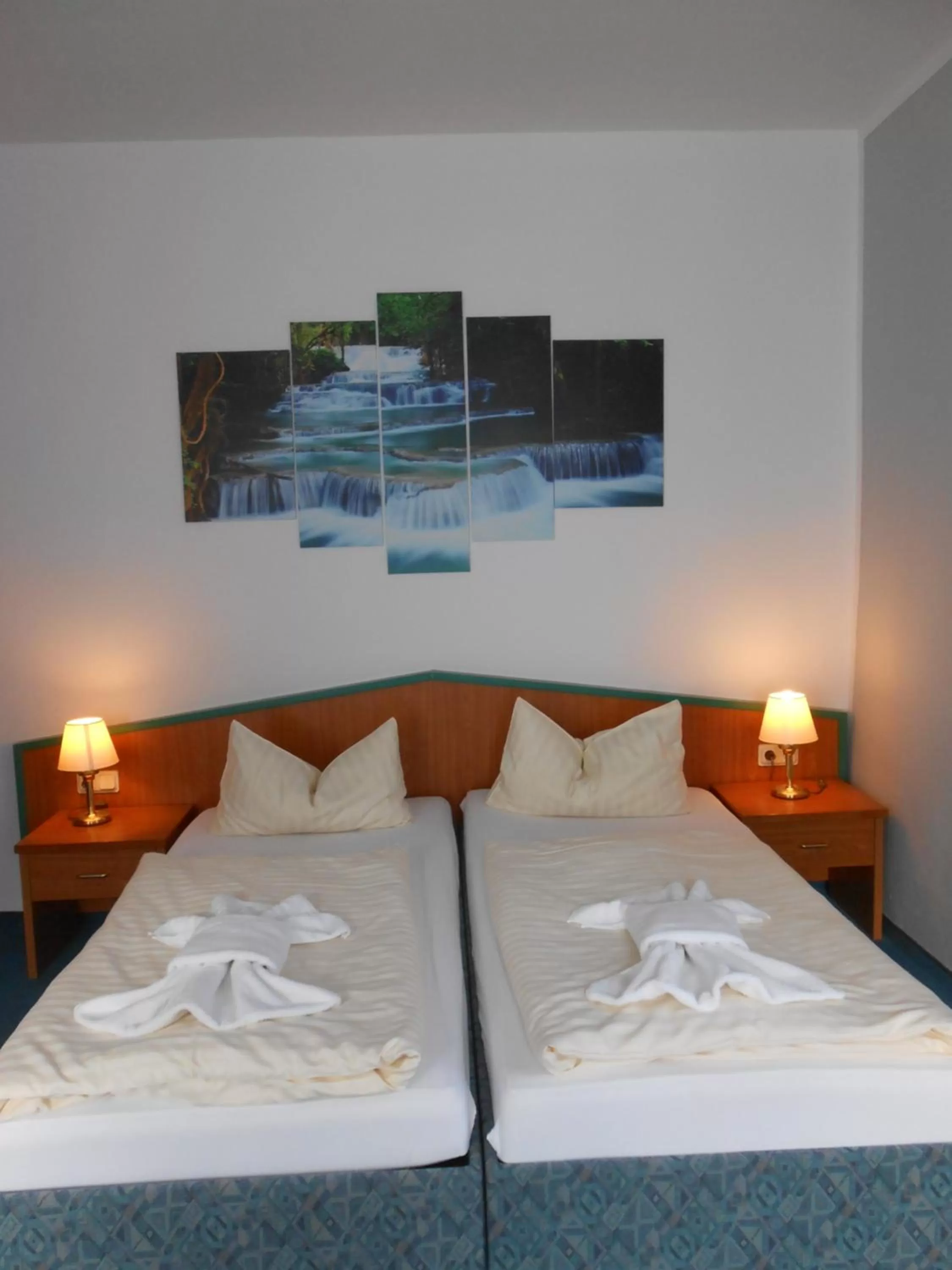 Bed in GreenLine Ferienhotel Forelle