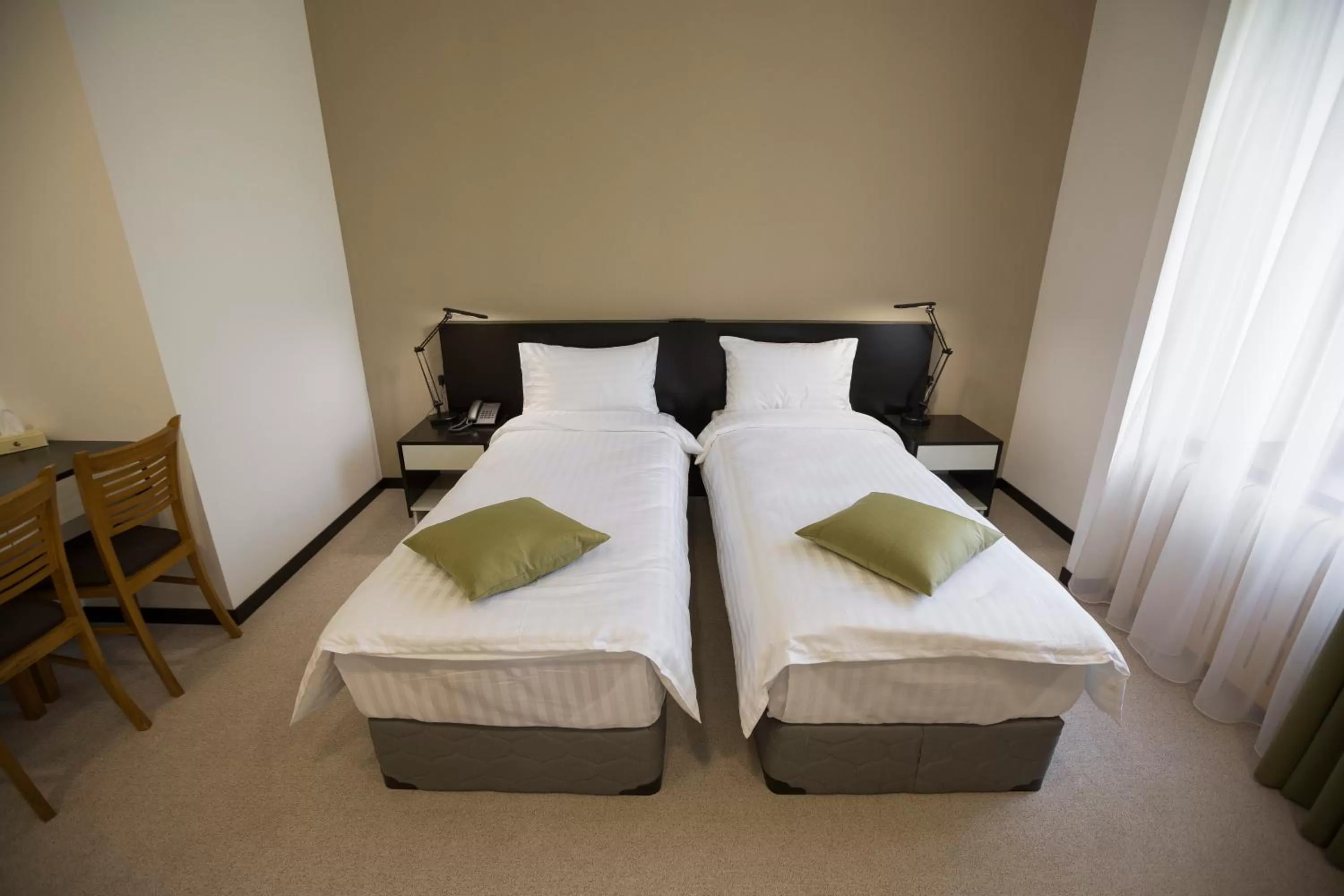 Bed in AnnaBella Boutique Hotel