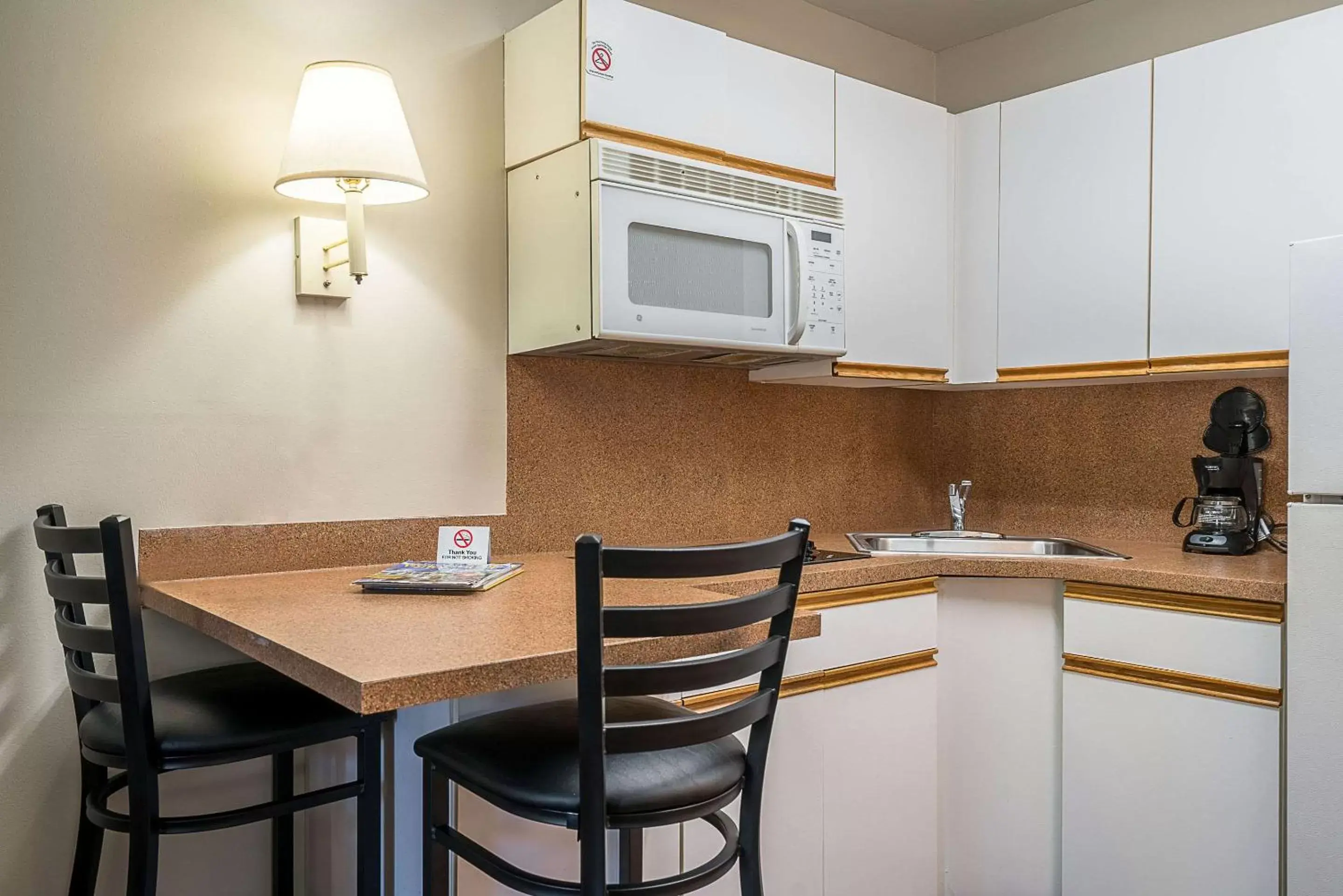 Kitchen or kitchenette, Kitchen/Kitchenette in Suburban Studios of Wilmington