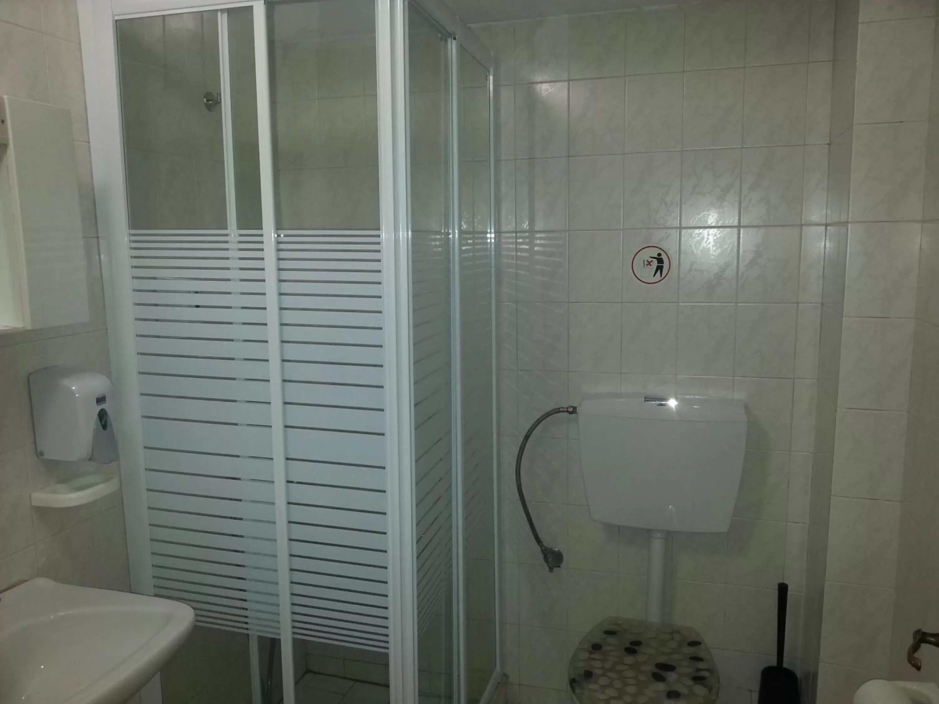 Bathroom in Alexandros Hotel