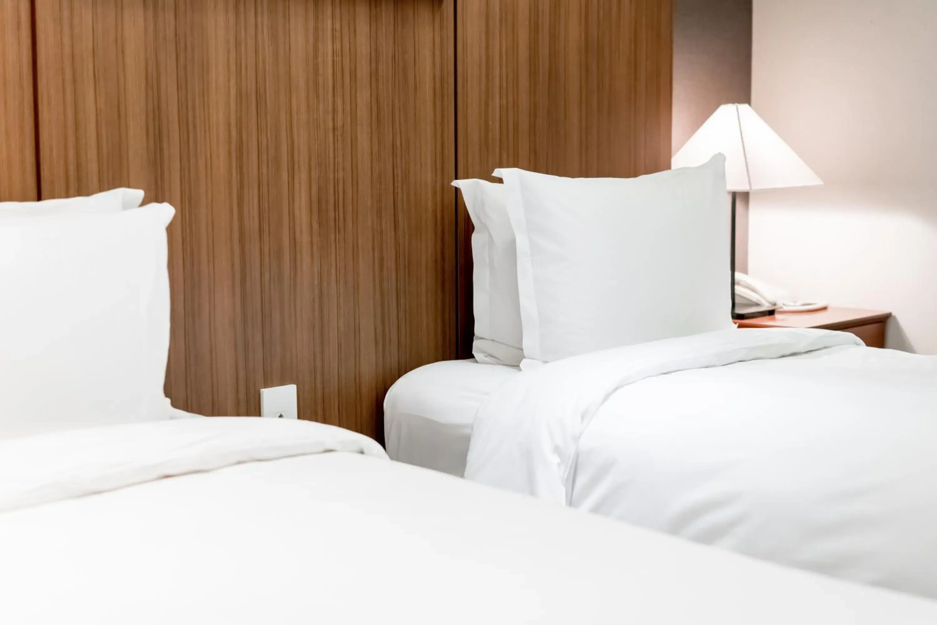 Bed in Oriens Hotel & Residences Myeongdong