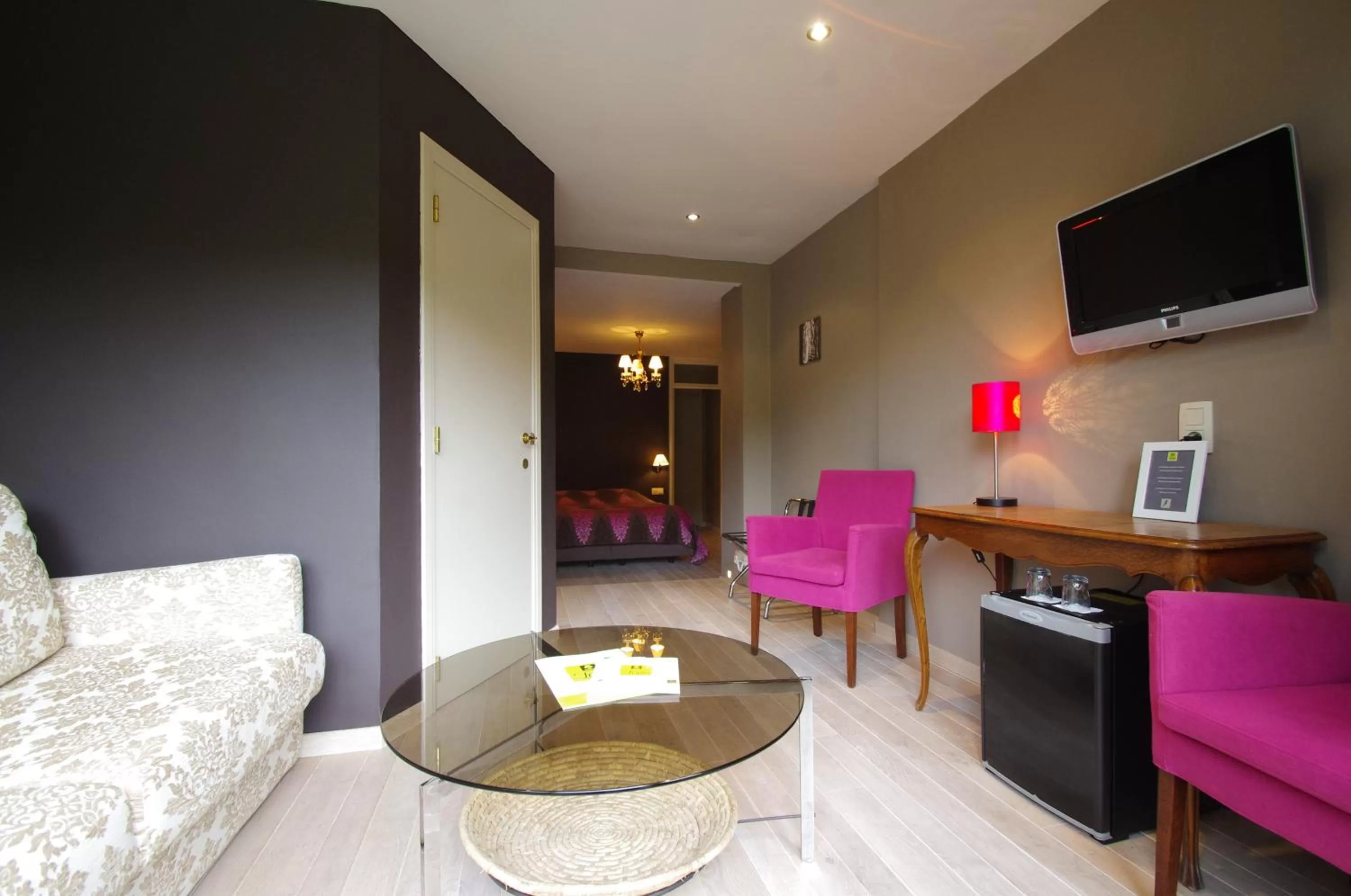 Seating area in Hostellerie La Claire Fontaine, Logis hôtels & Spa