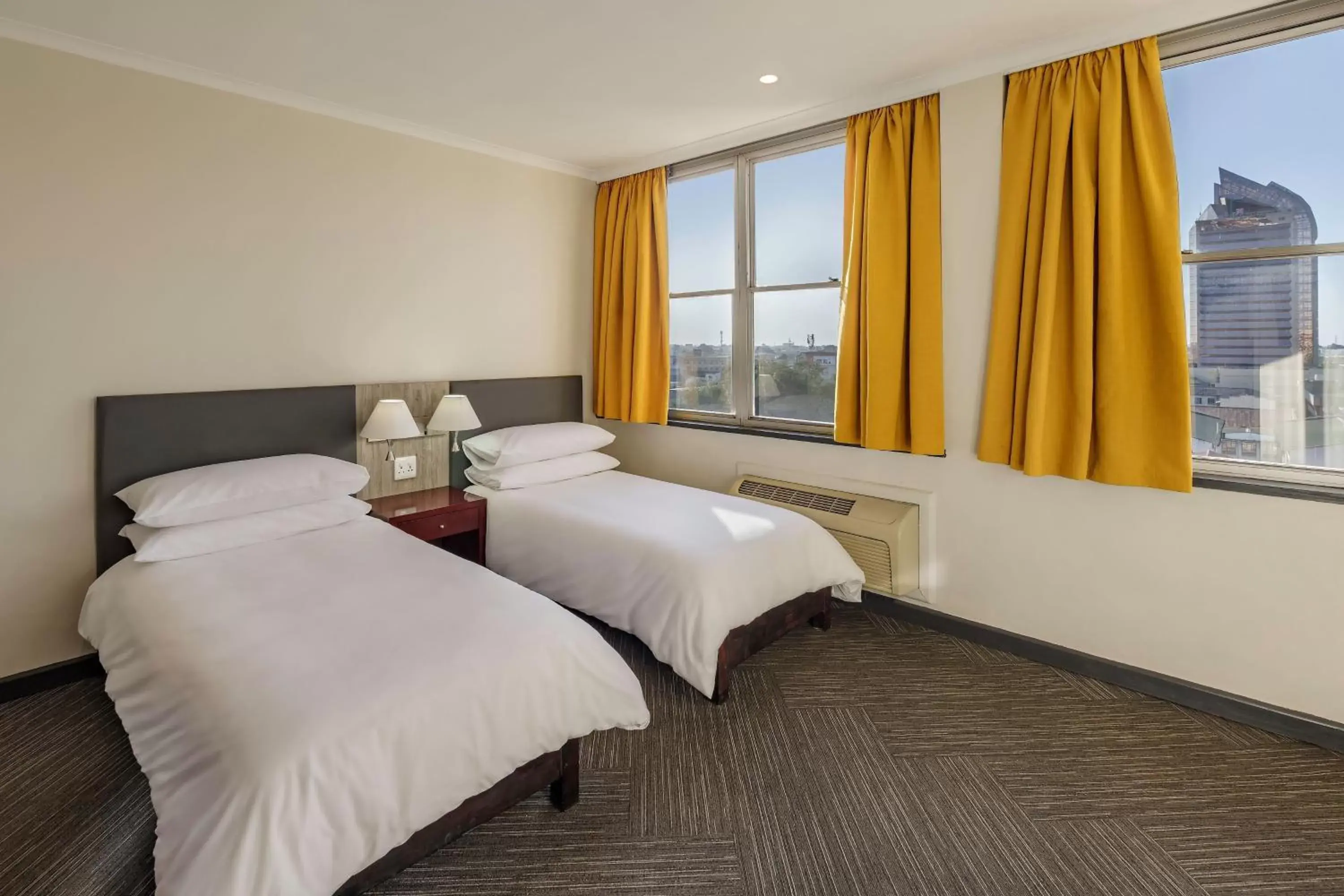 Photo of the whole room, Bed in Protea Hotel by Marriott Lusaka Cairo Road