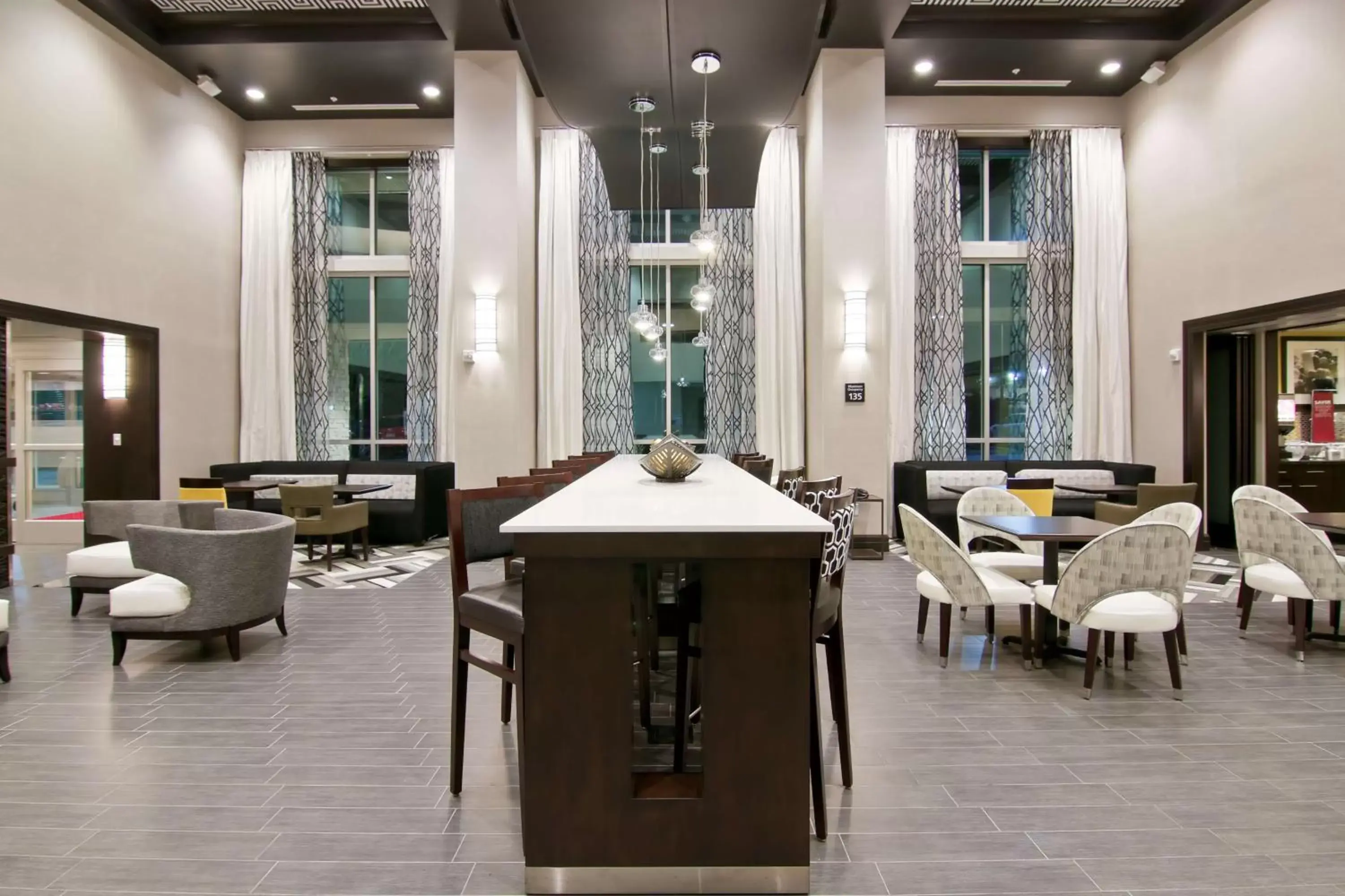 Lobby or reception in Hampton Inn & Suites Bellevue Downtown/Seattle Lobby or reception in Hampton Inn & Suites Bellevue Downtown/Seattle
